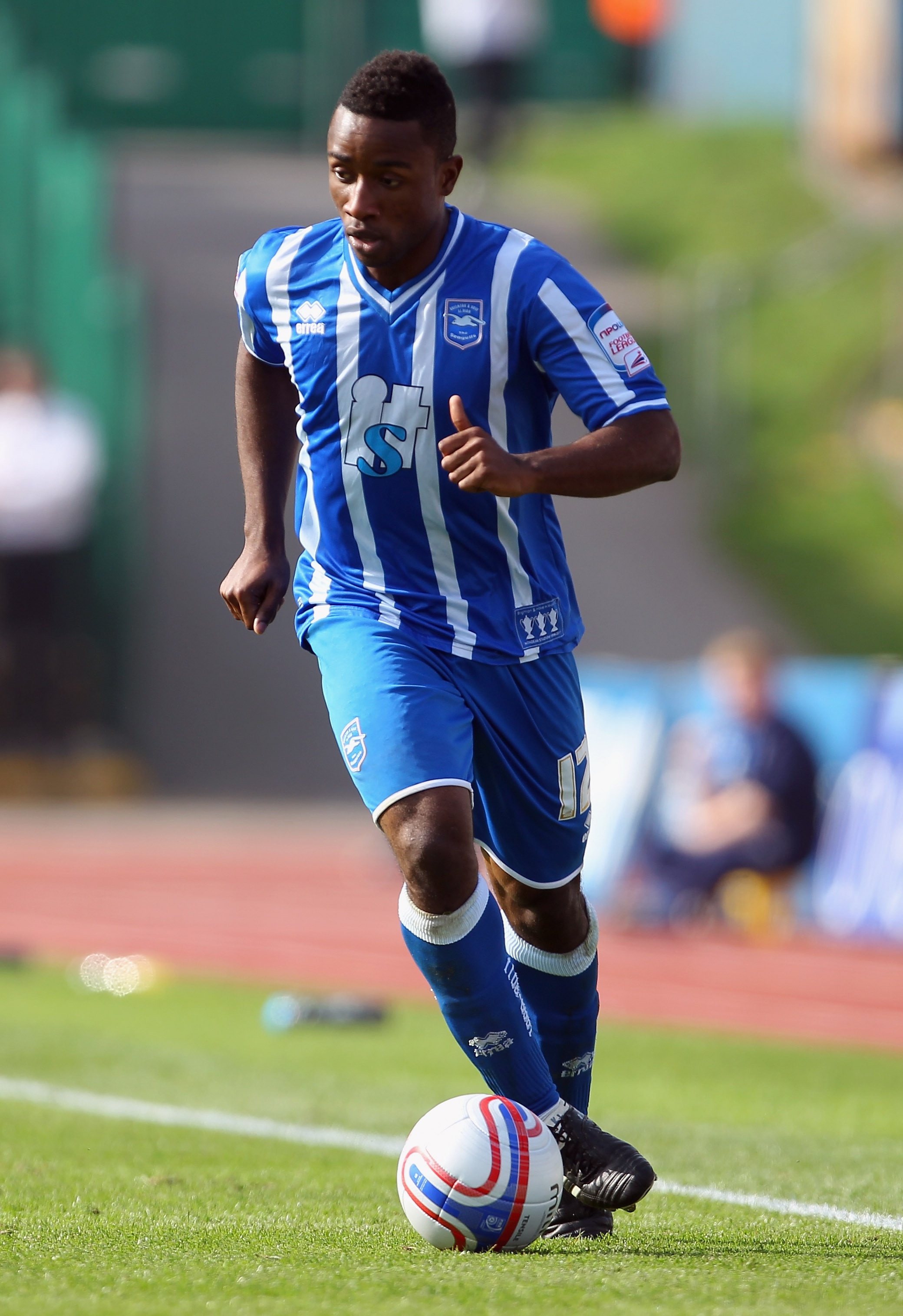 BRIGHTON, ENGLAND - OCTOBER 09:  Kazenga LuaLua of Brighton & Hove Albion in action during the npower League One match between Brighton & Hove Albion and Bournemouth at Withdean Stadium on October 9, 2010 in Brighton, United Kingdom.  (Photo by Clive Rose