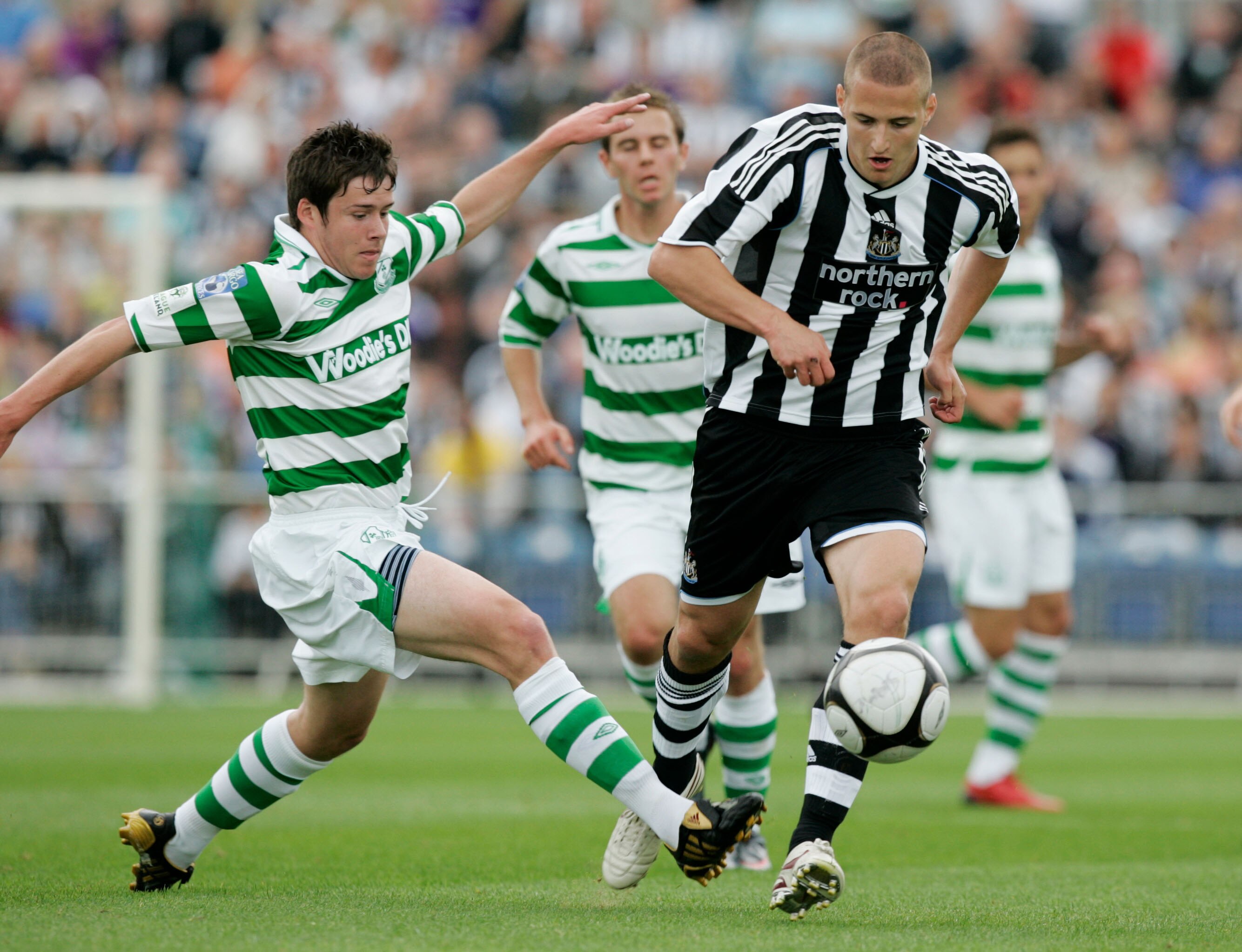 TALLAGHT, IRELAND - JULY 11: Tamas Kadar of Newcastle and Eric McGill of Shamrock Rovers in action during the pre-season friendly match between Shamrock Rovers and Newcastle United at the Tallaght Stadium on July 11, 2009 in Tallaght, Ireland. (Photo by P
