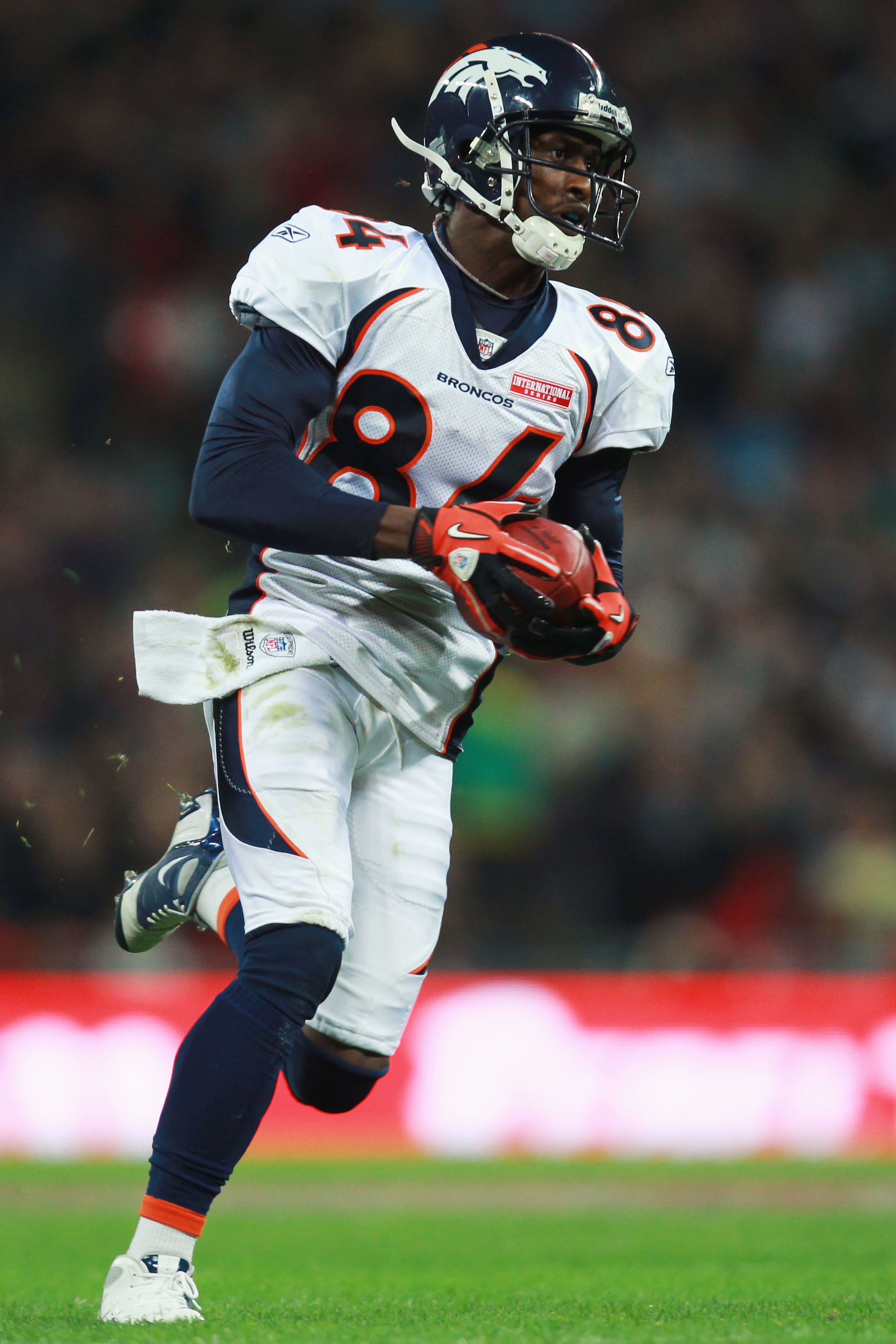 LONDON, ENGLAND - OCTOBER 31:  Brandon Lloyd #84 of Denver Broncos makes a break for the end zone during the NFL International Series match between Denver Broncos and San Francisco 49ers at Wembley Stadium on October 31, 2010 in London, England. This is t