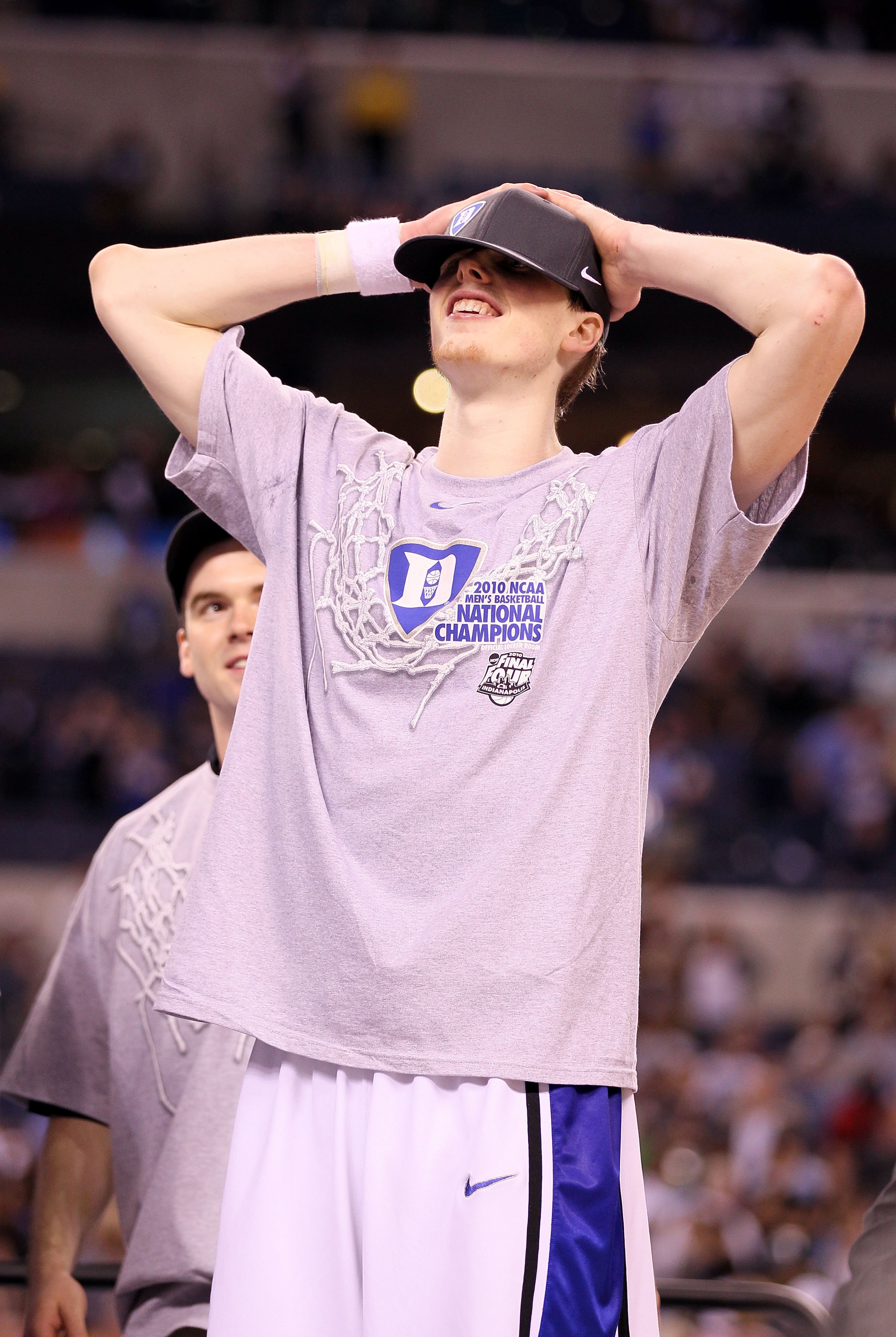 INDIANAPOLIS - APRIL 05:  Kyle Singler #12 of the Duke Blue Devils reacts as he celebrates after Duke won 61-59 against the Butler Bulldogs during the 2010 NCAA Division I Men's Basketball National Championship game at Lucas Oil Stadium on April 5, 2010 i