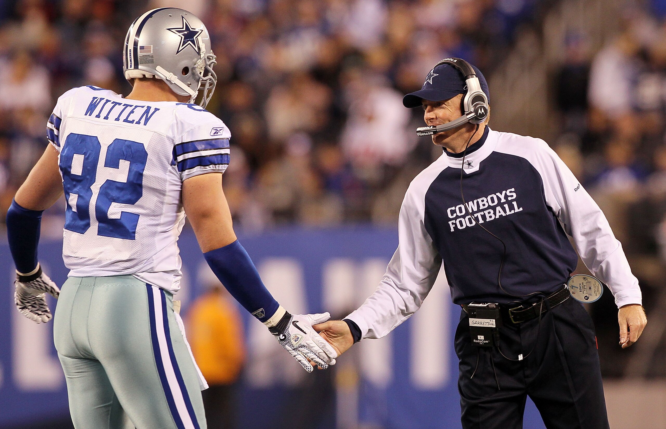EAST RUTHERFORD, NJ - NOVEMBER 14:  Head coach Jason Garrett of the Dallas Cowboys celebrates a play against the New York Giants with Jason Witten #82 on November 14, 2010 at the New Meadowlands Stadium in East Rutherford, New Jersey.  (Photo by Jim McIsa
