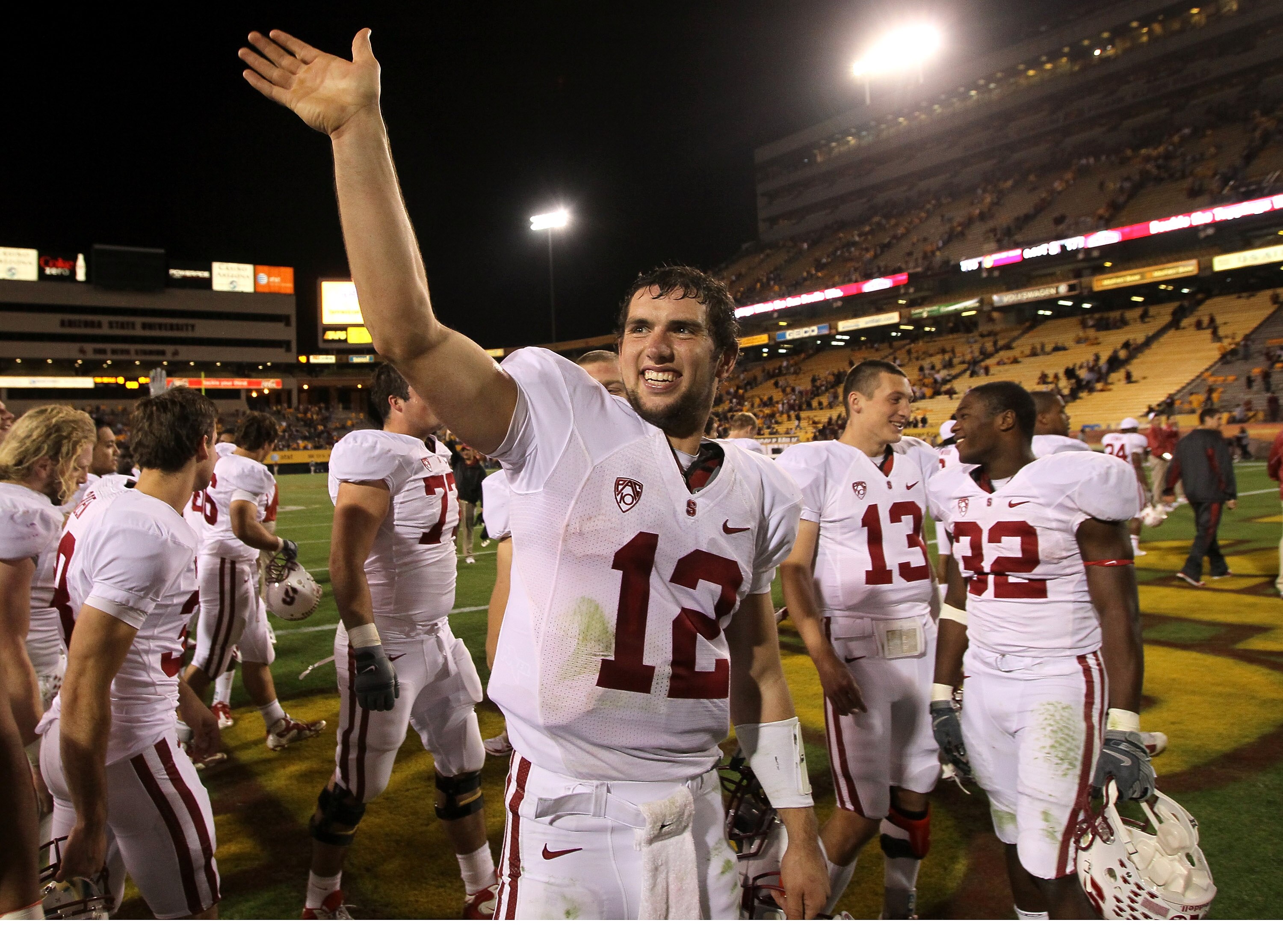 TEMPE, AZ - NOVEMBER 13:   Quarterback Andrew Luck #12 of the Stanford Cardinal waves to the Stanford cheering section after the game with the Arizona State Sun Devils at Sun Devil Stadium on November 13, 2010 in Tempe, Arizona.The Cardinal won 17-13.  (P