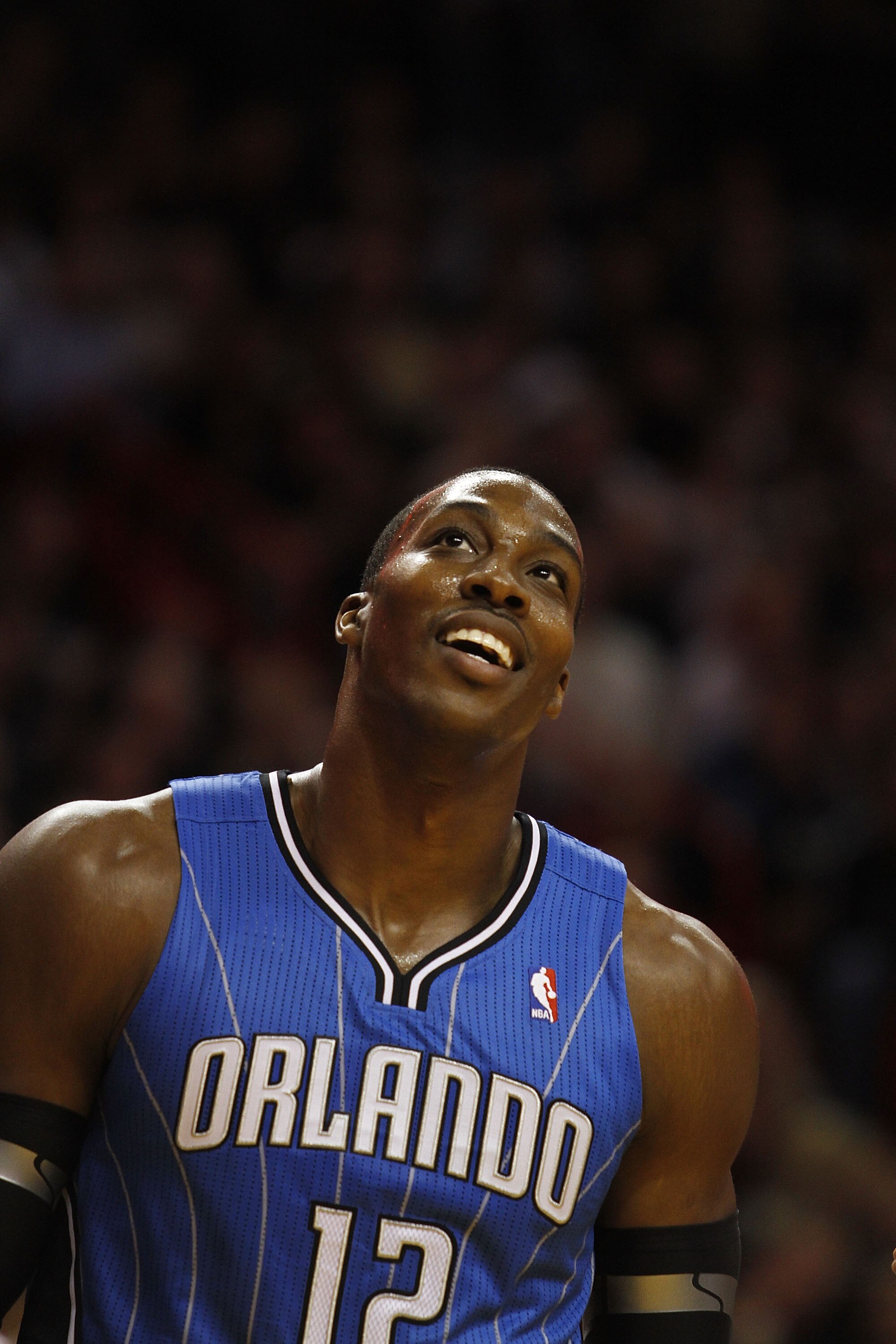 MIAMI - OCTOBER 29:  Center Dwight Howard #12  of the Orlando Magic dunks against the Miami Heat at American Airlines Arena on October 29, 2010 in Miami, Florida.  NOTE TO USER: User expressly acknowledges and agrees that, by downloading and or using this