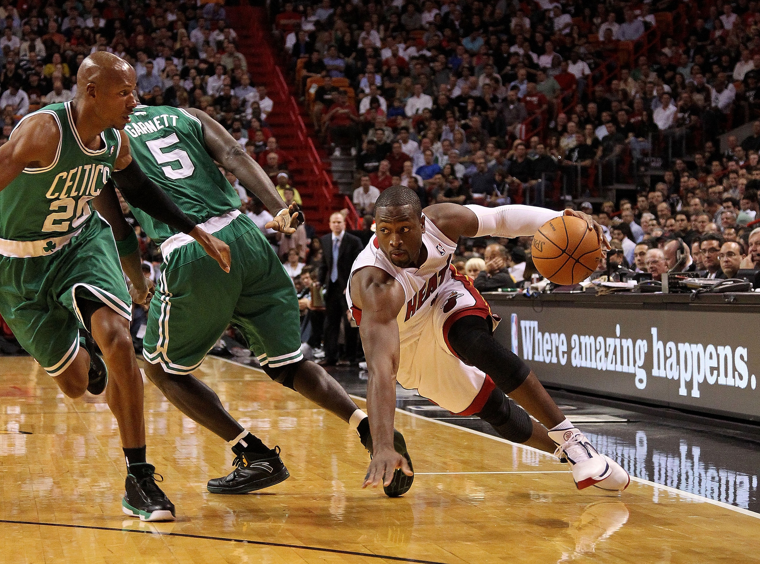 MIAMI - NOVEMBER 11:   Dwyane Wade #3 of the Miami Heat dribbles during a game against the Boston Celtics at American Airlines Arena on November 11, 2010 in Miami, Florida. NOTE TO USER: User expressly acknowledges and agrees that, by downloading and/or u