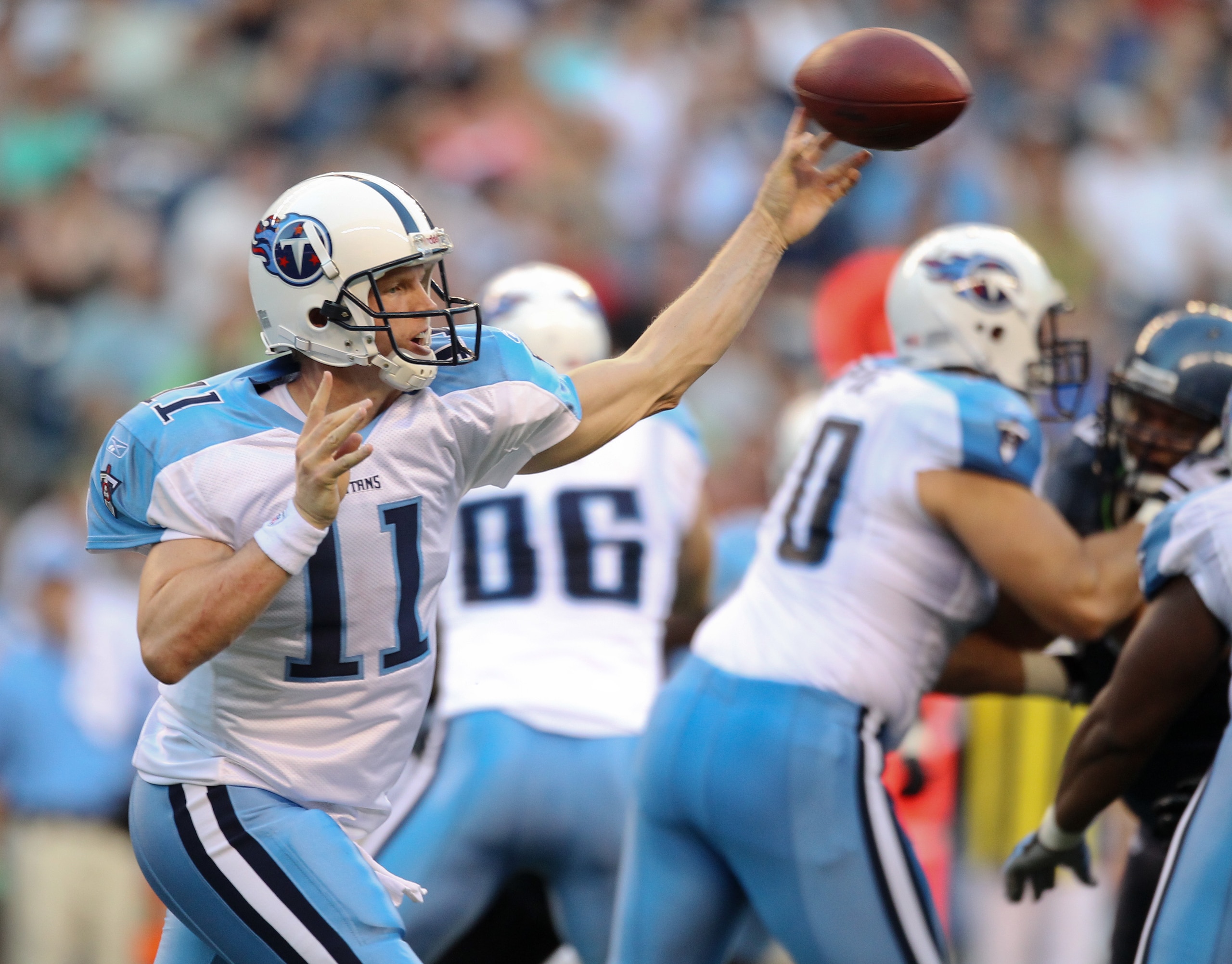 SEATTLE - AUGUST 14:  Quarterback Chris Simms #11 of the Tennessee Titans passes during the preseason game against the Seattle Seahawks at Qwest Field on August 14, 2010 in Seattle, Washington. (Photo by Otto Greule Jr/Getty Images)