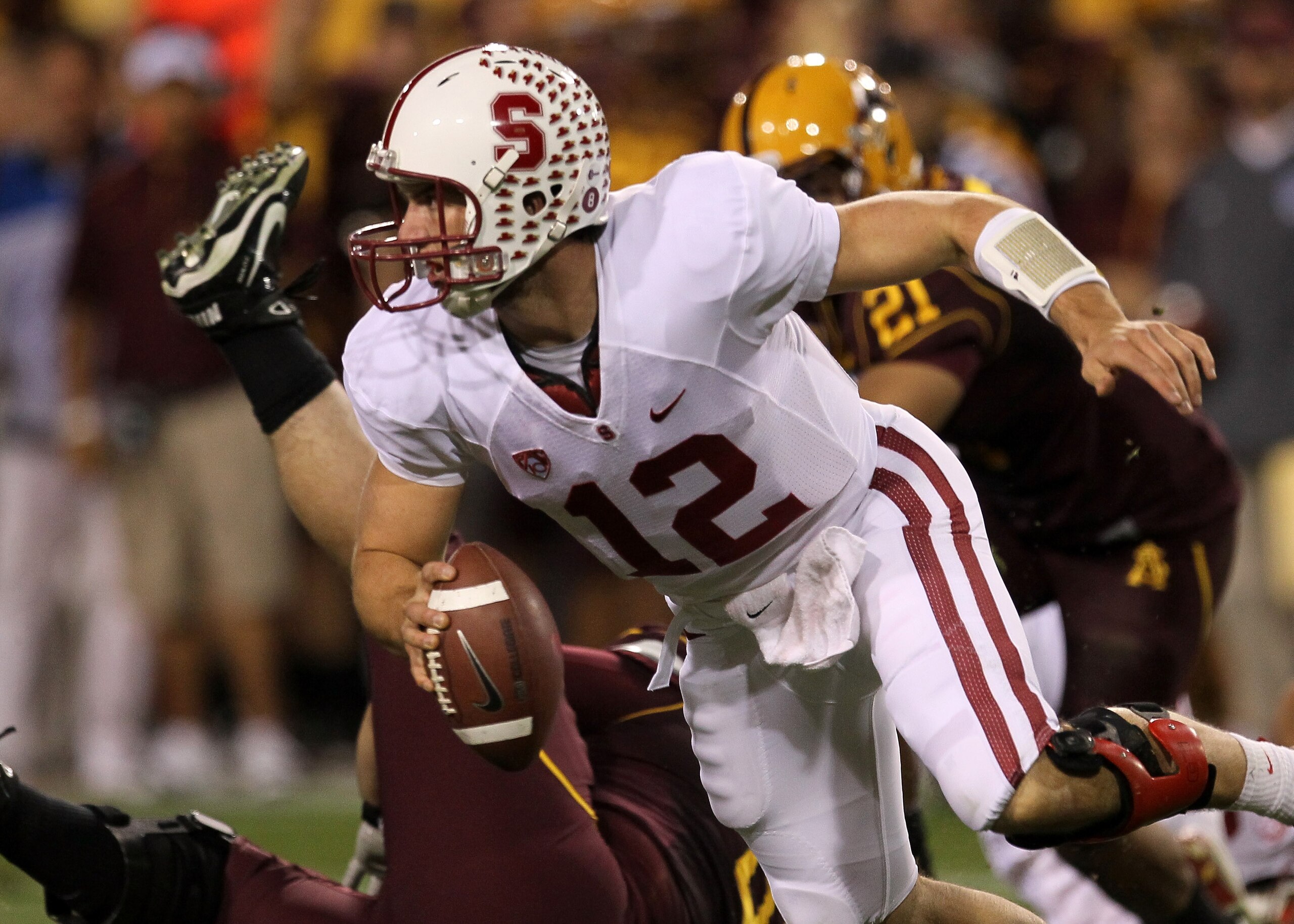 TEMPE, AZ - NOVEMBER 13: Quarterback Andrew Luck #12 of the Stanford Cardinal scrambles with the ball against the Arizona State Sun Devils at Sun Devil Stadium on November 13, 2010 in Tempe, Arizona. (Photo by Stephen Dunn/Getty Images) TEMPE, AZ - NOVEMBER 13: Quarterback Andrew Luck #12 of the Stanford Cardinal scrambles with the ball against the Arizona State Sun Devils at Sun Devil Stadium on November 13, 2010 in Tempe, Arizona. (Photo by Stephen Dunn/Getty Images)