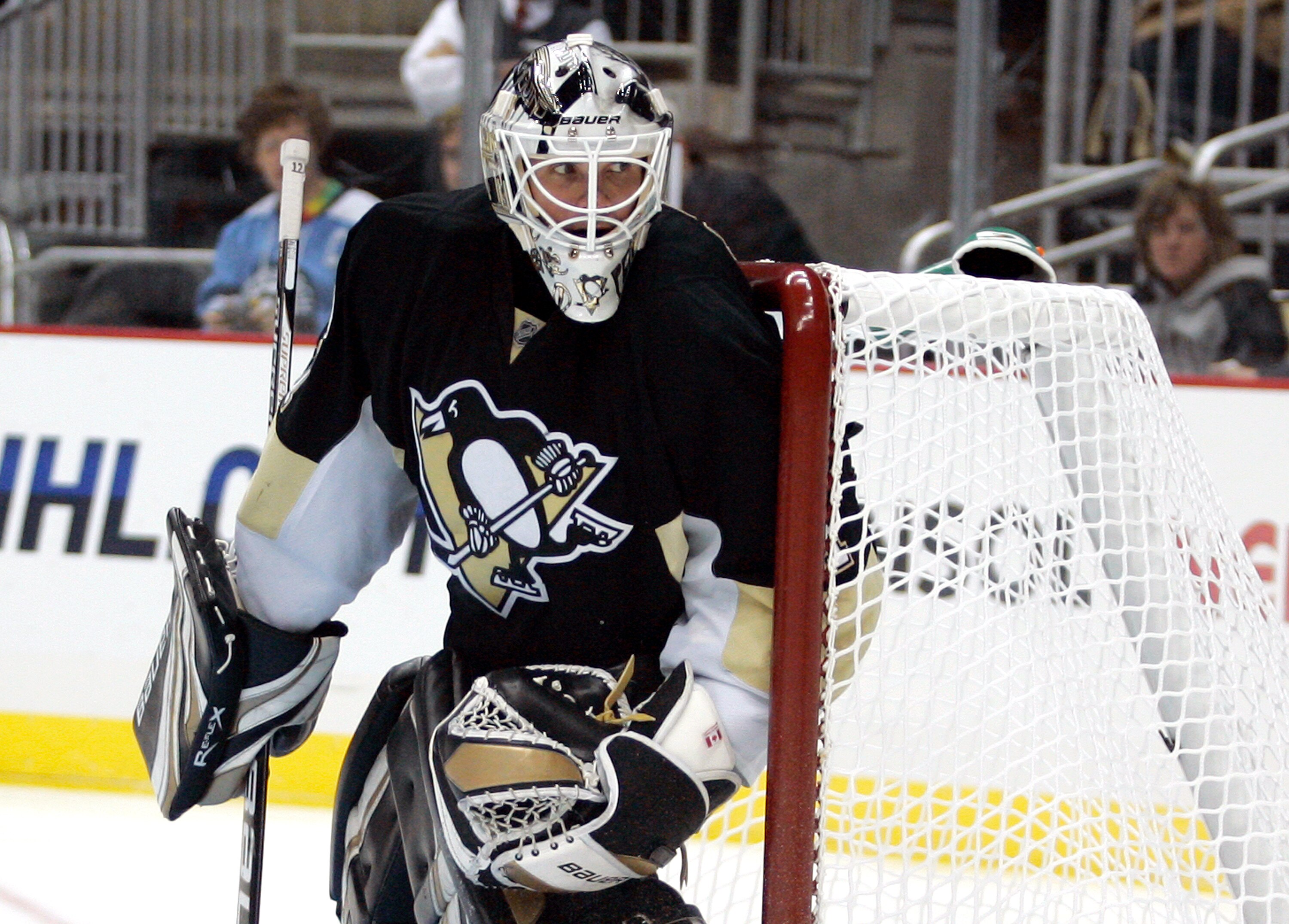 PITTSBURGH - NOVEMBER 10:  Brent Johnson #1 of the Pittsburgh Penguins eyes the puck in the corner against the Boston Bruins at Consol Energy Center on November 10, 2010 in Pittsburgh, Pennsylvania.  (Photo by Justin K. Aller/Getty Images)