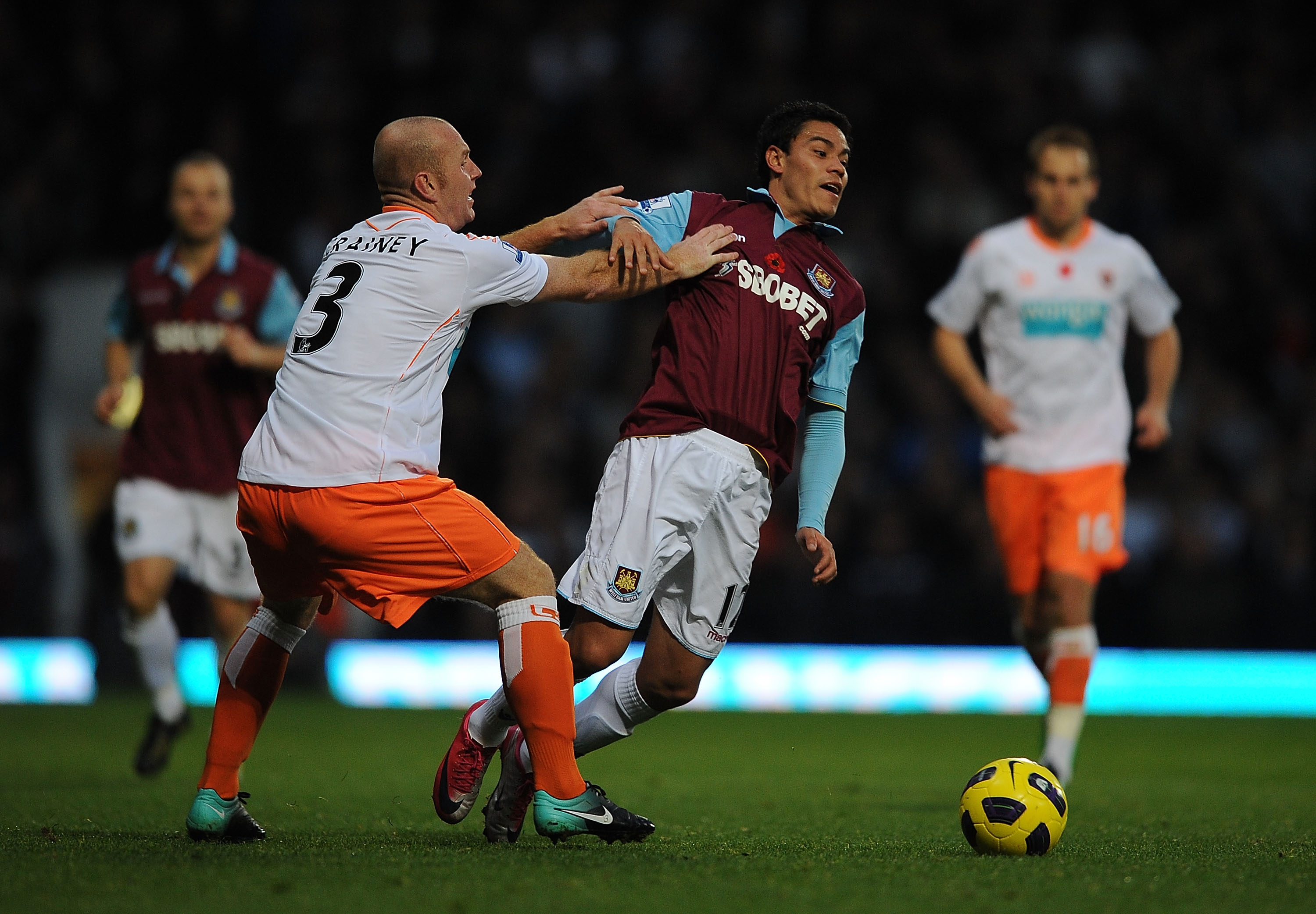 LONDON, ENGLAND - NOVEMBER 13: Pablo Barrera of West Ham is challenged by Stephen Crainey of Blackpool during the Barclays Premier League match between West Ham United and Blackpool at Boleyn Ground on November 13, 2010 in London, England. (Photo by Chr LONDON, ENGLAND - NOVEMBER 13: Pablo Barrera of West Ham is challenged by Stephen Crainey of Blackpool during the Barclays Premier League match between West Ham United and Blackpool at Boleyn Ground on November 13, 2010 in London, England. (Photo by Chr