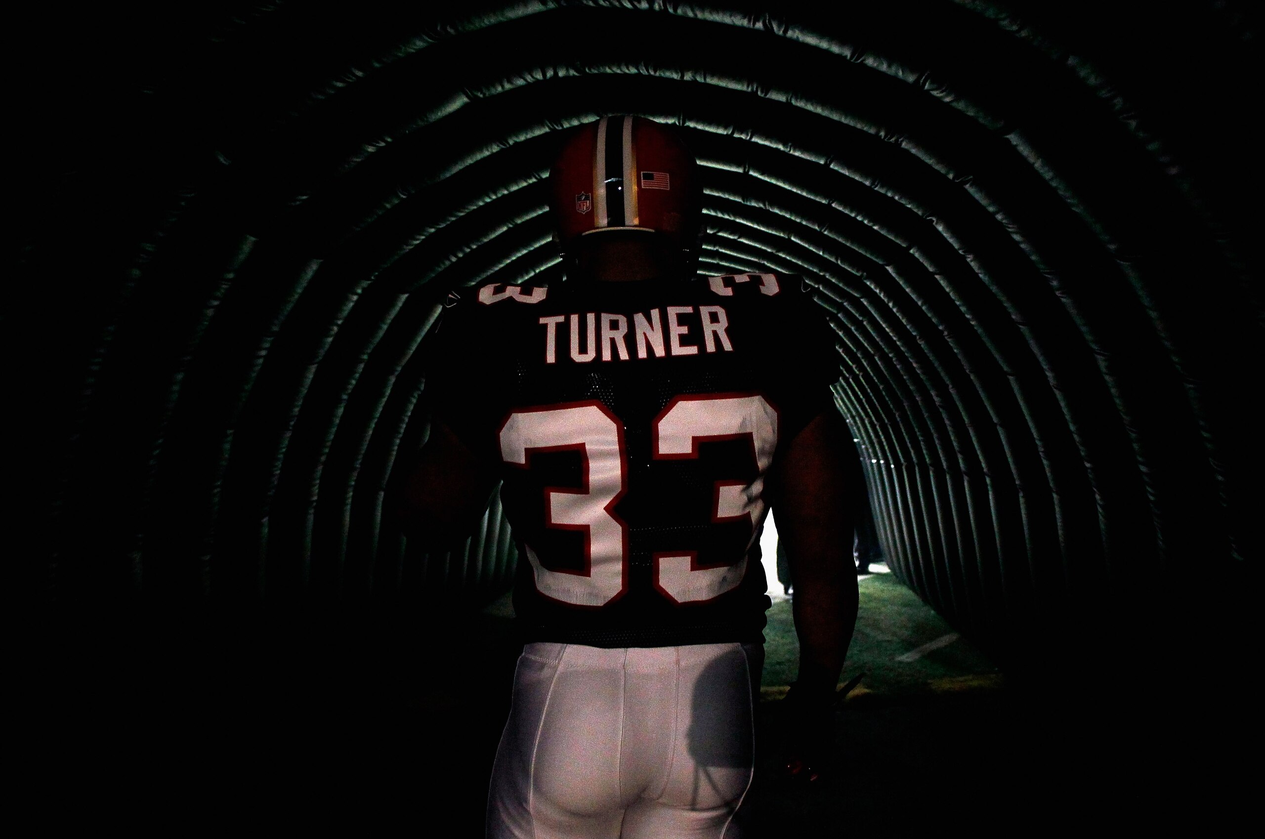 ATLANTA - NOVEMBER 11:  Michael Turner #33 of the Atlanta Falcons waits to enter the field during player introductions before facing the Baltimore Ravens at Georgia Dome on November 11, 2010 in Atlanta, Georgia.  (Photo by Kevin C. Cox/Getty Images)