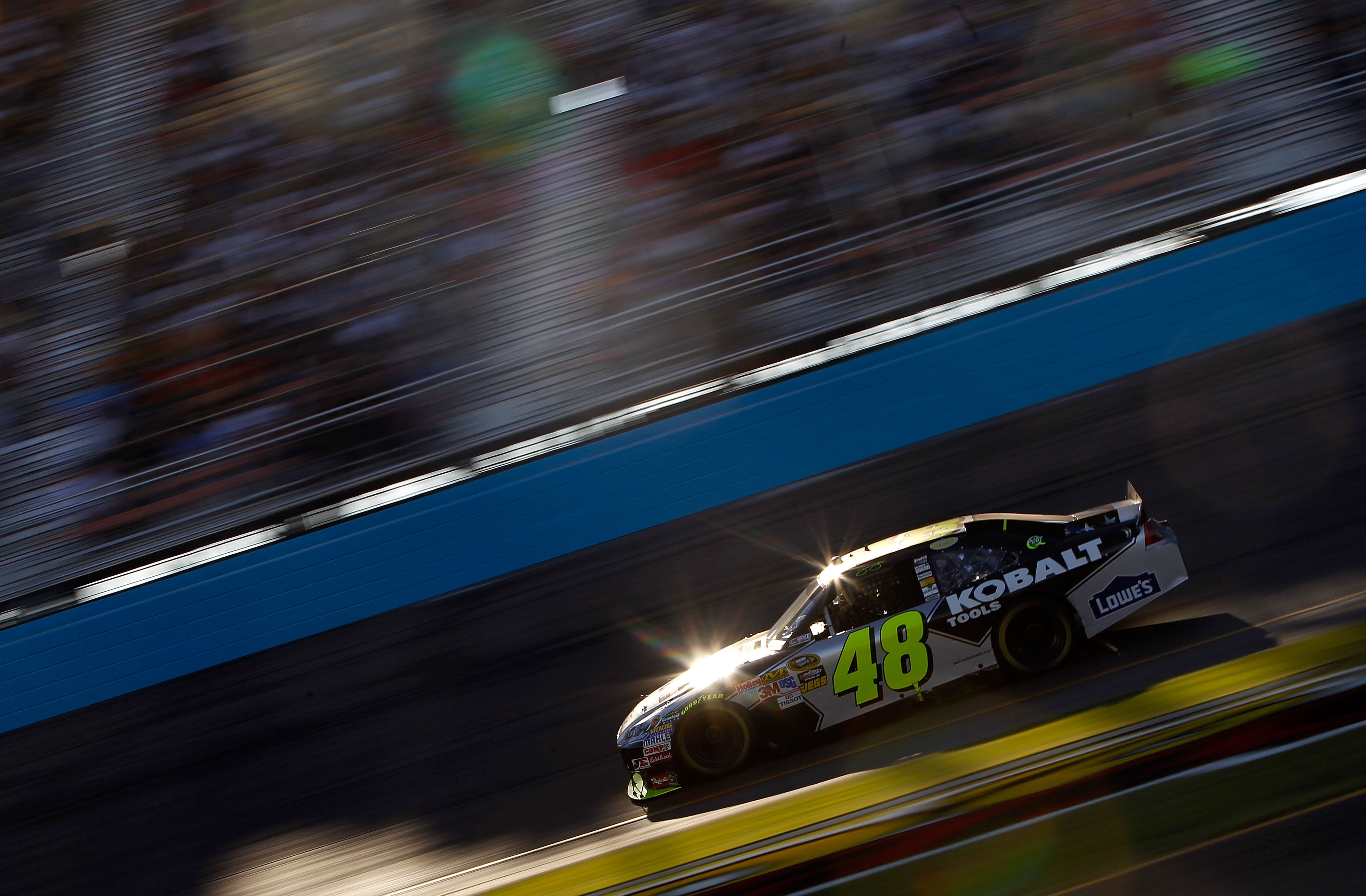 AVONDALE, AZ - NOVEMBER 14:  Jimmie Johnson, driver of the #48 Lowe's Chevrolet, races during the NASCAR Sprint Cup Series Kobalt Tools 500 at Phoenix International Raceway on November 14, 2010 in Avondale, Arizona.  (Photo by Chris Trotman/Getty Images)