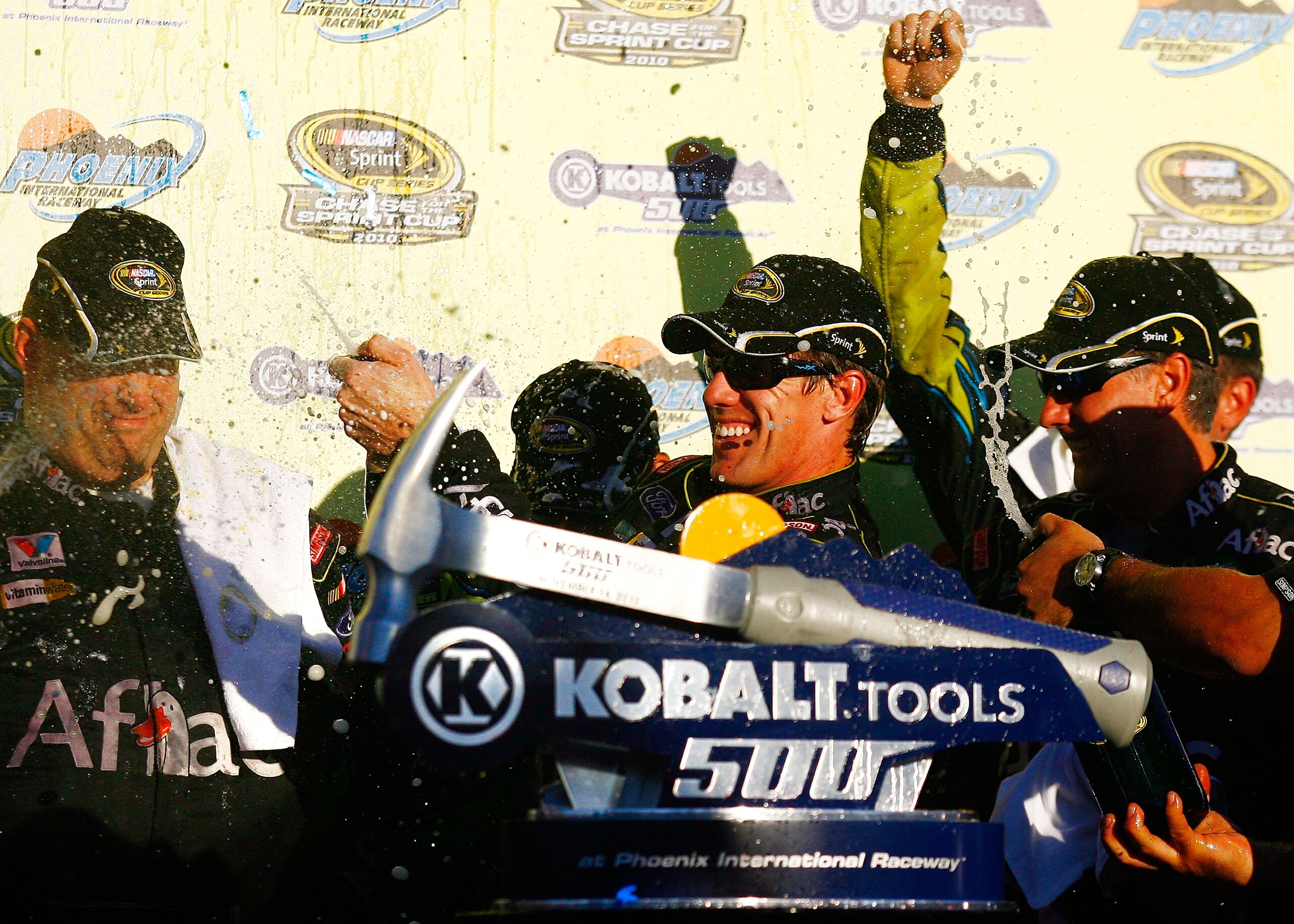 AVONDALE, AZ - NOVEMBER 14: Carl Edwards (C), driver of the #99 Aflac Ford, celebrates in victory lane after winning the NASCAR Sprint Cup Series Kobalt Tools 500 at Phoenix International Raceway on November 14, 2010 in Avondale, Arizona. (Photo by Jaso AVONDALE, AZ - NOVEMBER 14: Carl Edwards (C), driver of the #99 Aflac Ford, celebrates in victory lane after winning the NASCAR Sprint Cup Series Kobalt Tools 500 at Phoenix International Raceway on November 14, 2010 in Avondale, Arizona. (Photo by Jaso