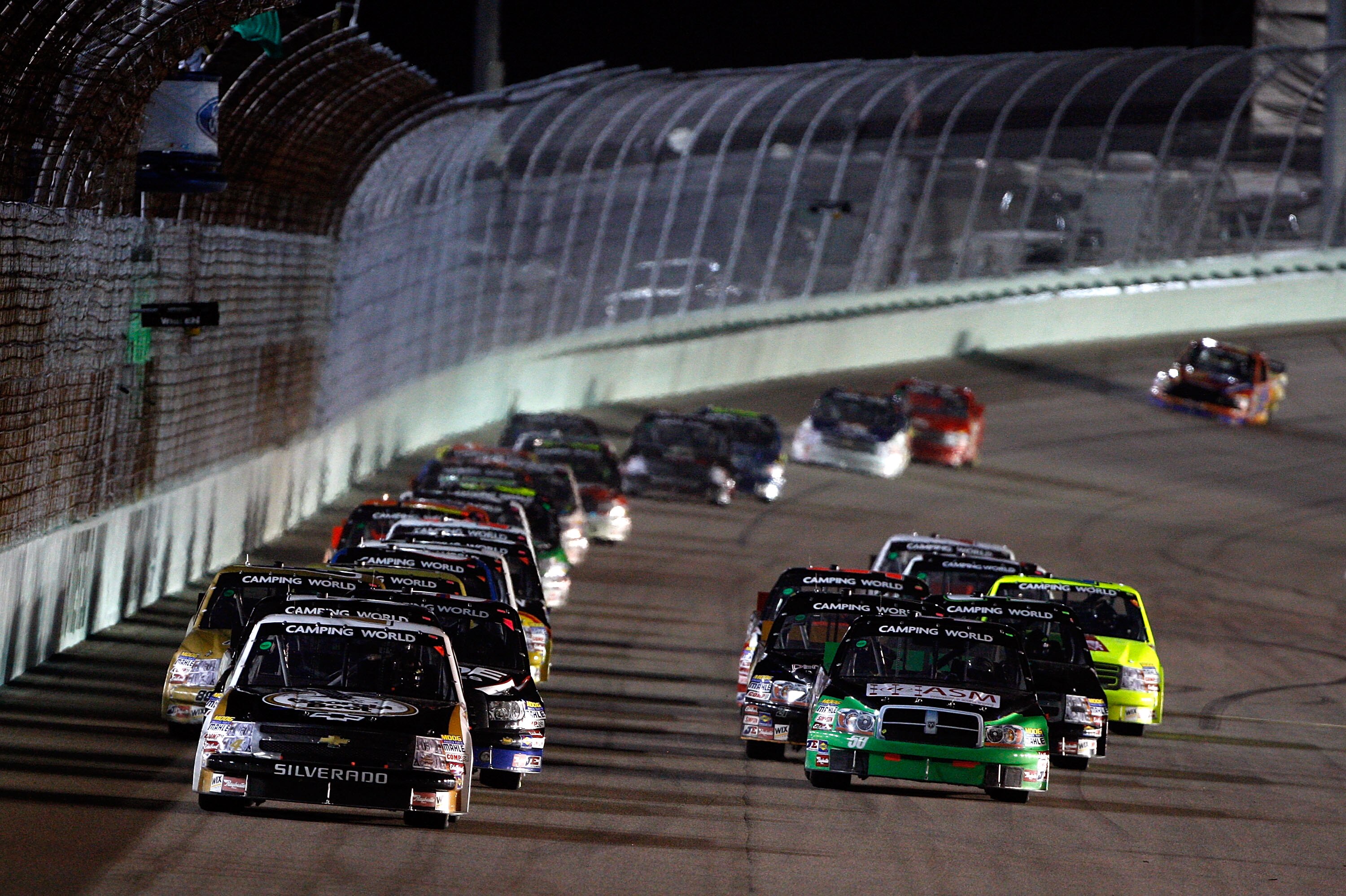 HOMESTEAD, FL - NOVEMBER 20:  Kevin Harvick, driver of the #4 Georgia Boot Chevrolet, leads the field to a restart during the NASCAR Camping World Truck Series Ford 200 at Homestead-Miami Speedway on November 20, 2009 in Homestead, Florida.  (Photo by Chr
