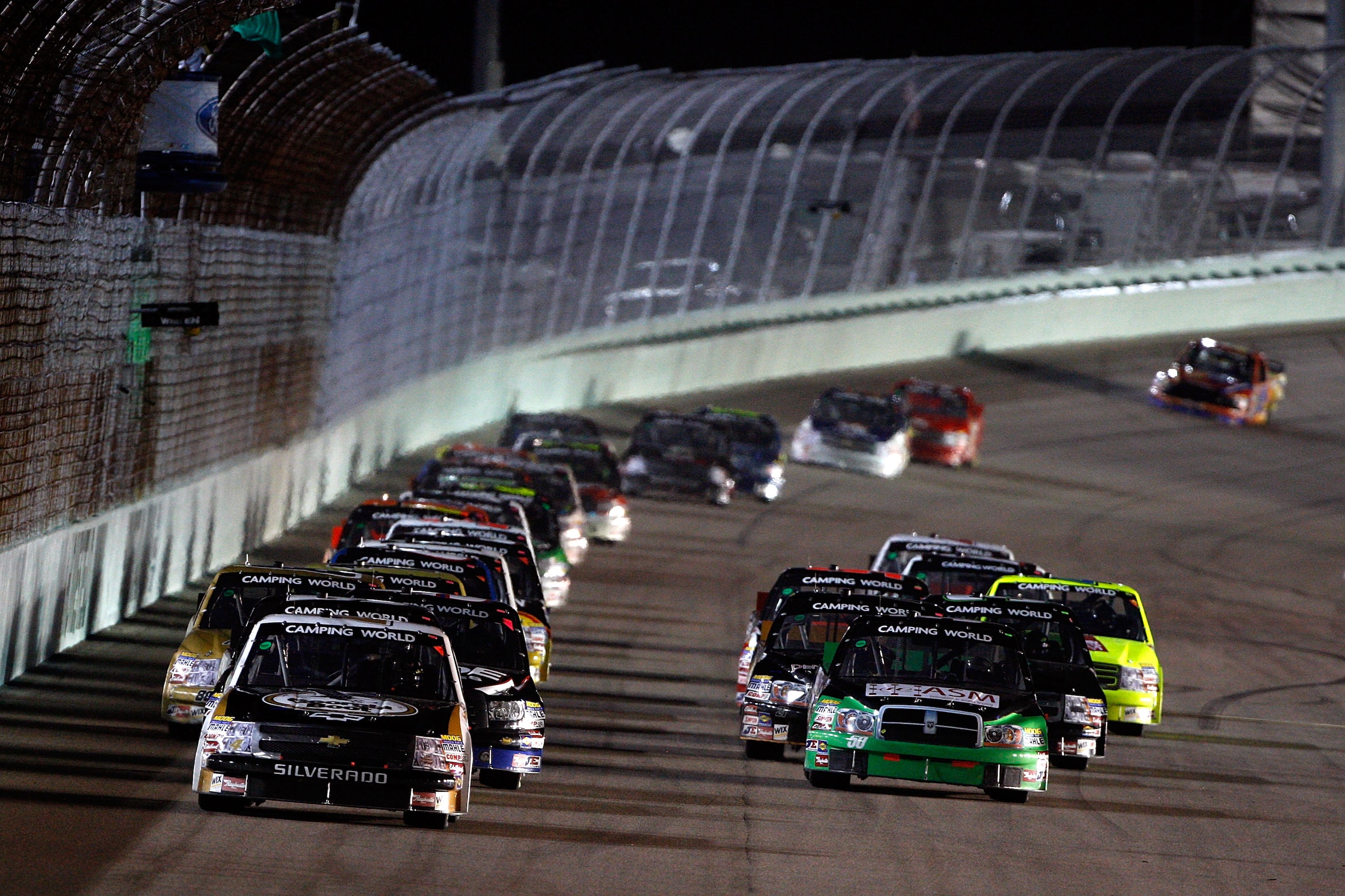 HOMESTEAD, FL - NOVEMBER 20:  Kevin Harvick, driver of the #4 Georgia Boot Chevrolet, leads the field to a restart during the NASCAR Camping World Truck Series Ford 200 at Homestead-Miami Speedway on November 20, 2009 in Homestead, Florida.  (Photo by Chr