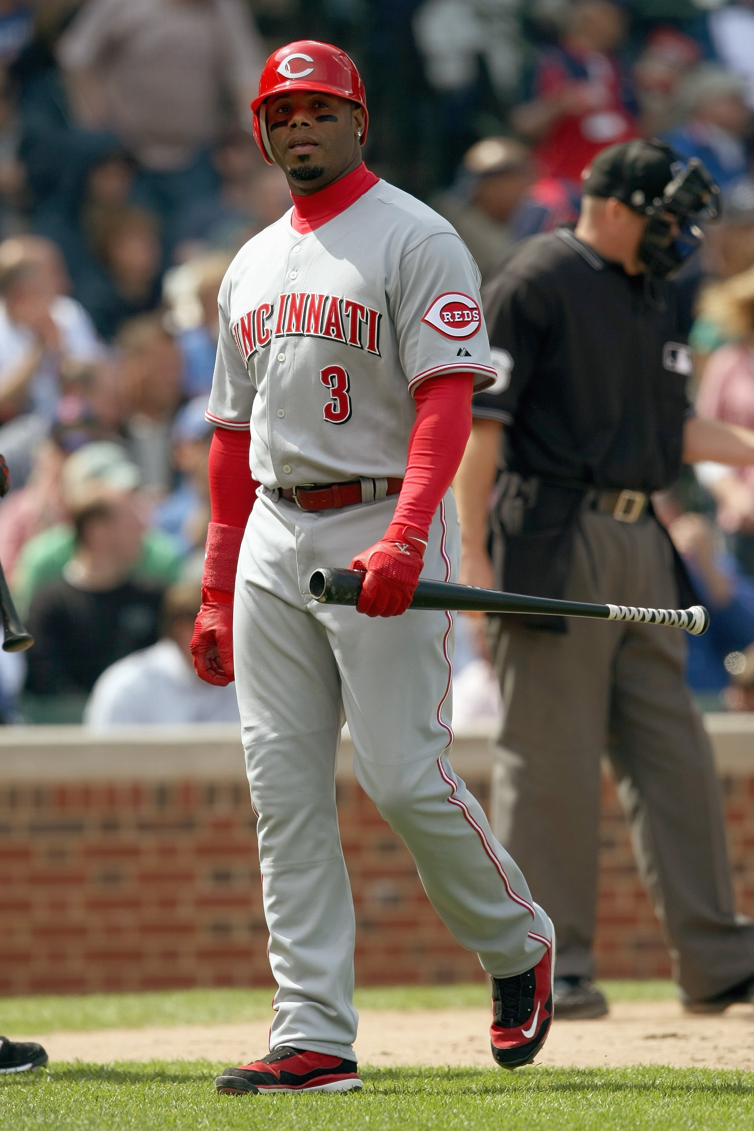 CHICAGO - APRIL 17: Ken Griffey #3 of the Cincinnati Reds walks off after striking out during the game against the Chicago Cubs on April 17, 2008 at Wrigley Field in Chicago, Illinois. The Reds defeated the Cubs 9-2. (Photo by Jonathan Daniel/Getty Images