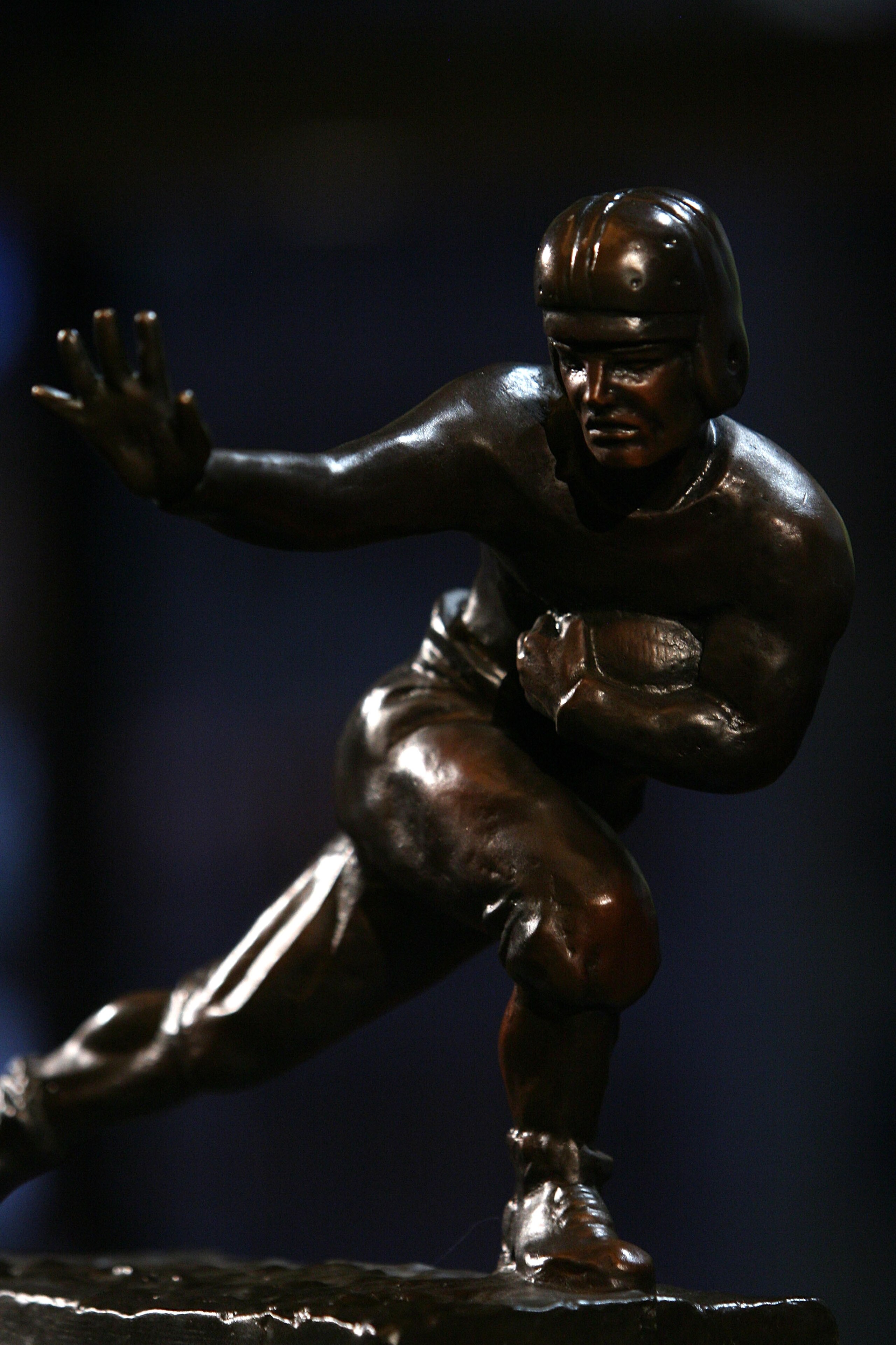 NEW YORK - DECEMBER 12: The Heisman trophy awarded to Running back Mark Ingram #22 of the Alabama Crimson Tide at a press conference after he was named the 75th Heisman Trophy winner at the Marriott Marquis on December 12, 2009 in New York City. (Photo b NEW YORK - DECEMBER 12: The Heisman trophy awarded to Running back Mark Ingram #22 of the Alabama Crimson Tide at a press conference after he was named the 75th Heisman Trophy winner at the Marriott Marquis on December 12, 2009 in New York City. (Photo b