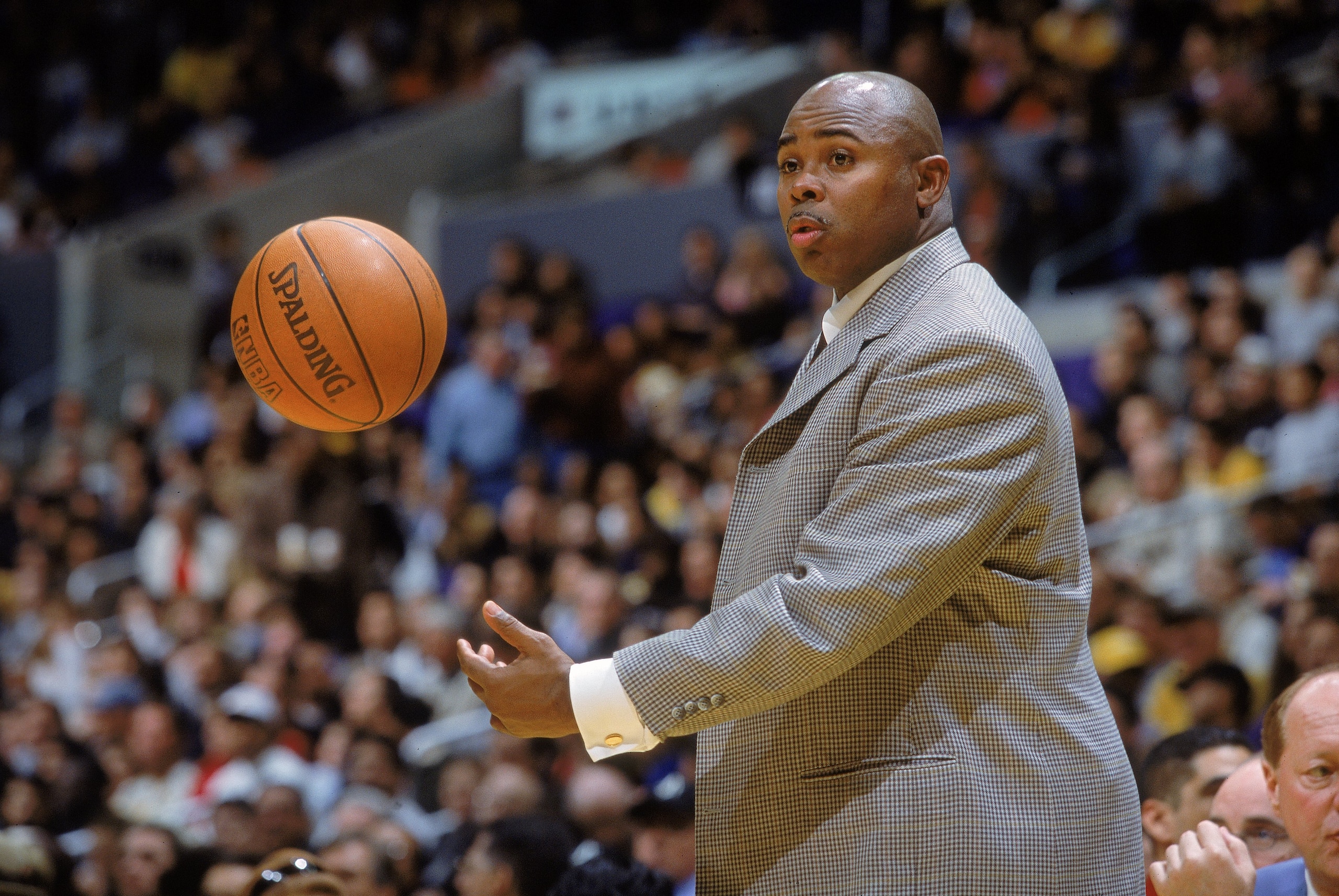 15 Dec 2000:   Head Coach Sydney Lowe of the Vancouver Grizzlies tosses a basketball on the sidelines during the game against the Los Angeles Lakers at the STAPLES Center in Los Angeles, California.  The Lakers defeated the Grizzlies 92-90.     NOTE TO US