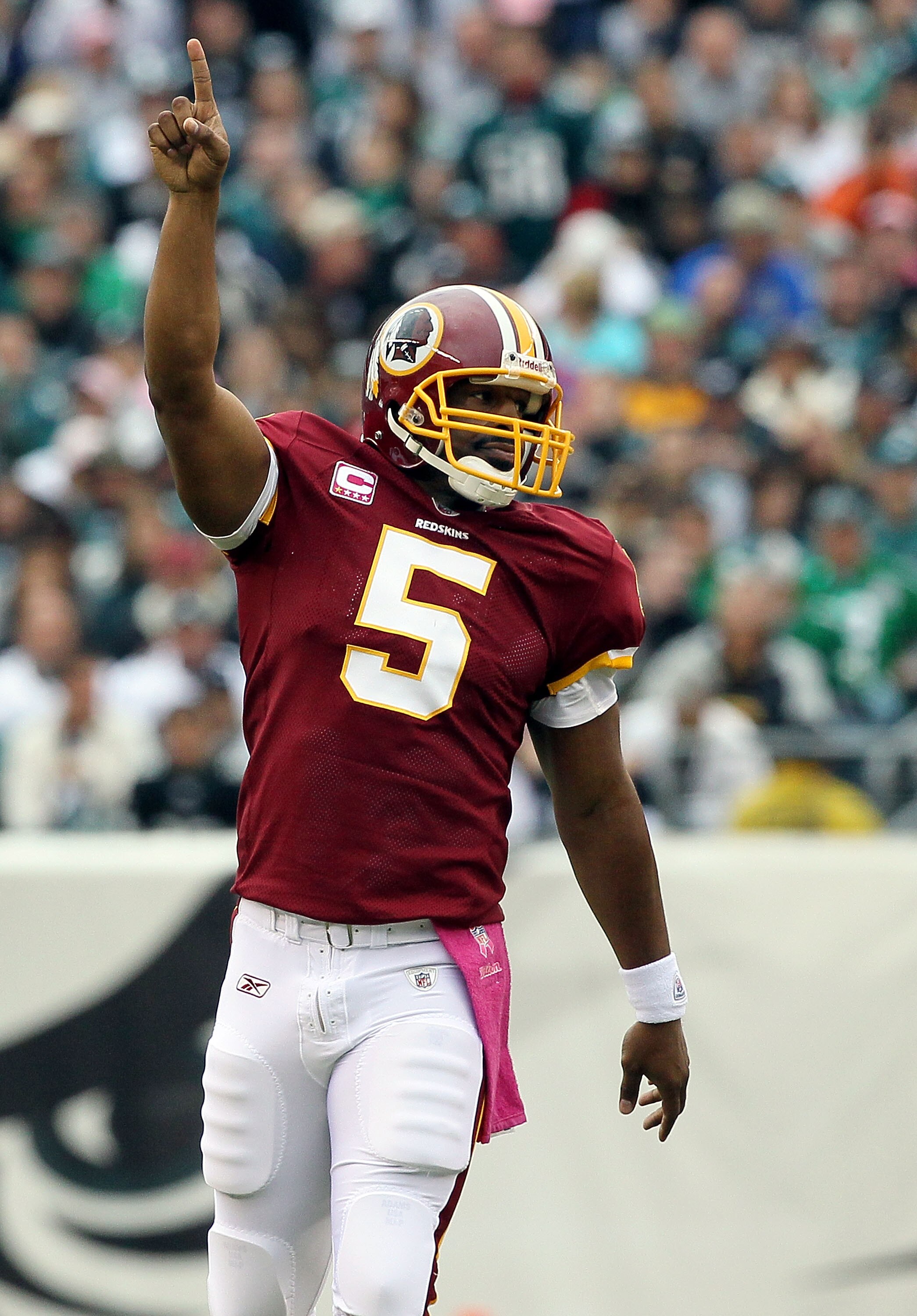 PHILADELPHIA - OCTOBER 03:  Donovan McNabb #5 of the Washington Redskins celebrates after throwing a first quater touchdown pass against the Philadelphia Eagles on October 3, 2010 at Lincoln Financial Field in Philadelphia, Pennsylvania.  (Photo by Jim Mc