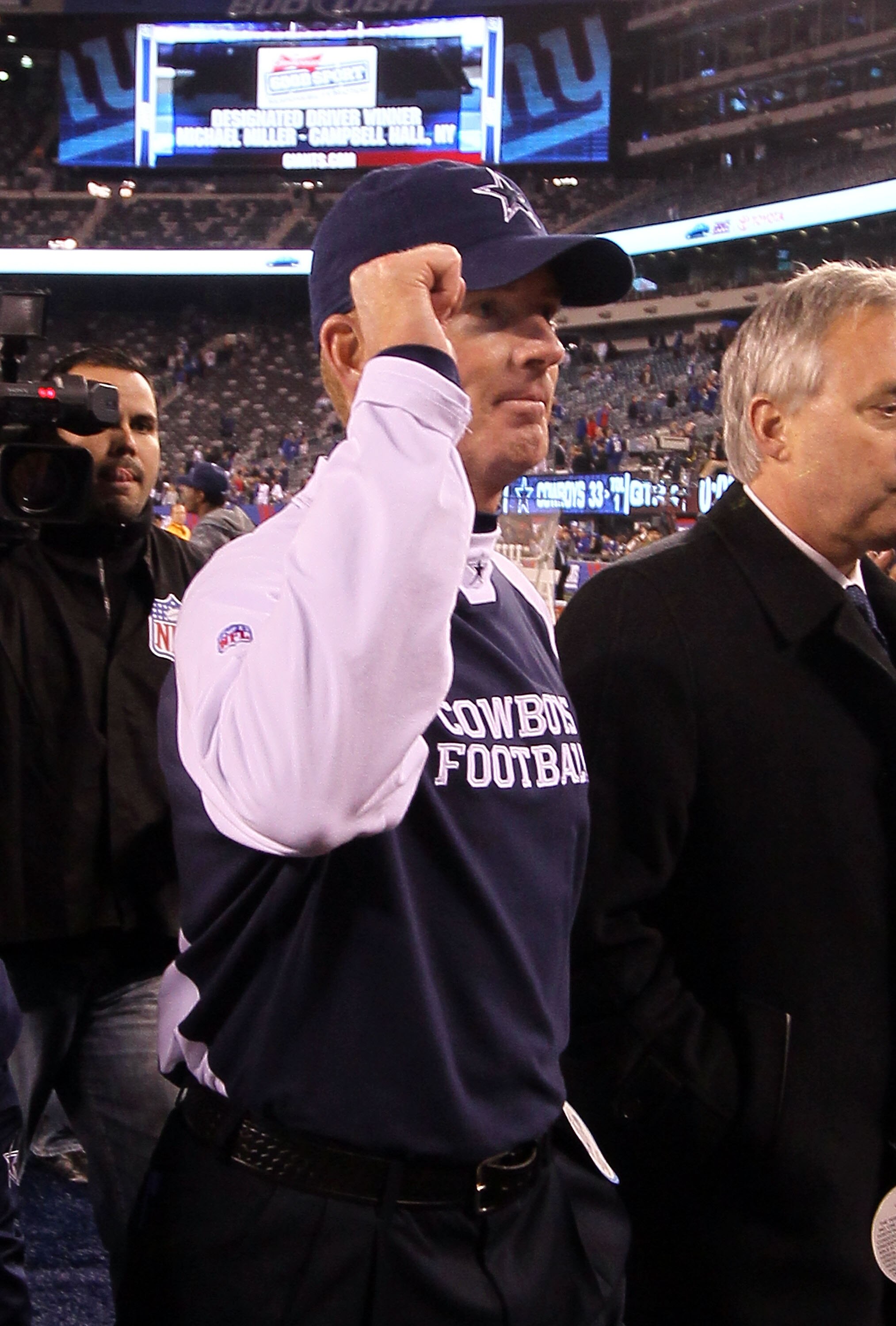 EAST RUTHERFORD, NJ - NOVEMBER 14: Head coach Jason Garrett of the Dallas Cowboys celebrates as he walks off the field after defeating the New York Giants on November 14, 2010 at the New Meadowlands Stadium in East Rutherford, New Jersey. The Cowboys defe