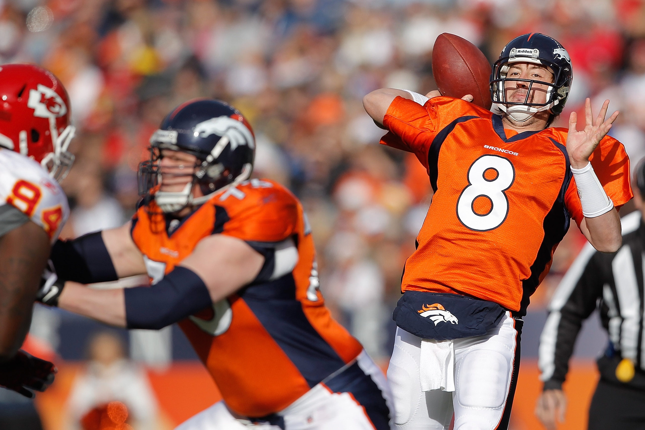DENVER - NOVEMBER 14:  Quarterback Kyle Orton #8 of the Denver Broncos makes a pass against the Kansas City Chiefs in the first quarter at INVESCO Field at Mile High on November 14, 2010 in Denver, Colorado. (Photo by Justin Edmonds/Getty Images)