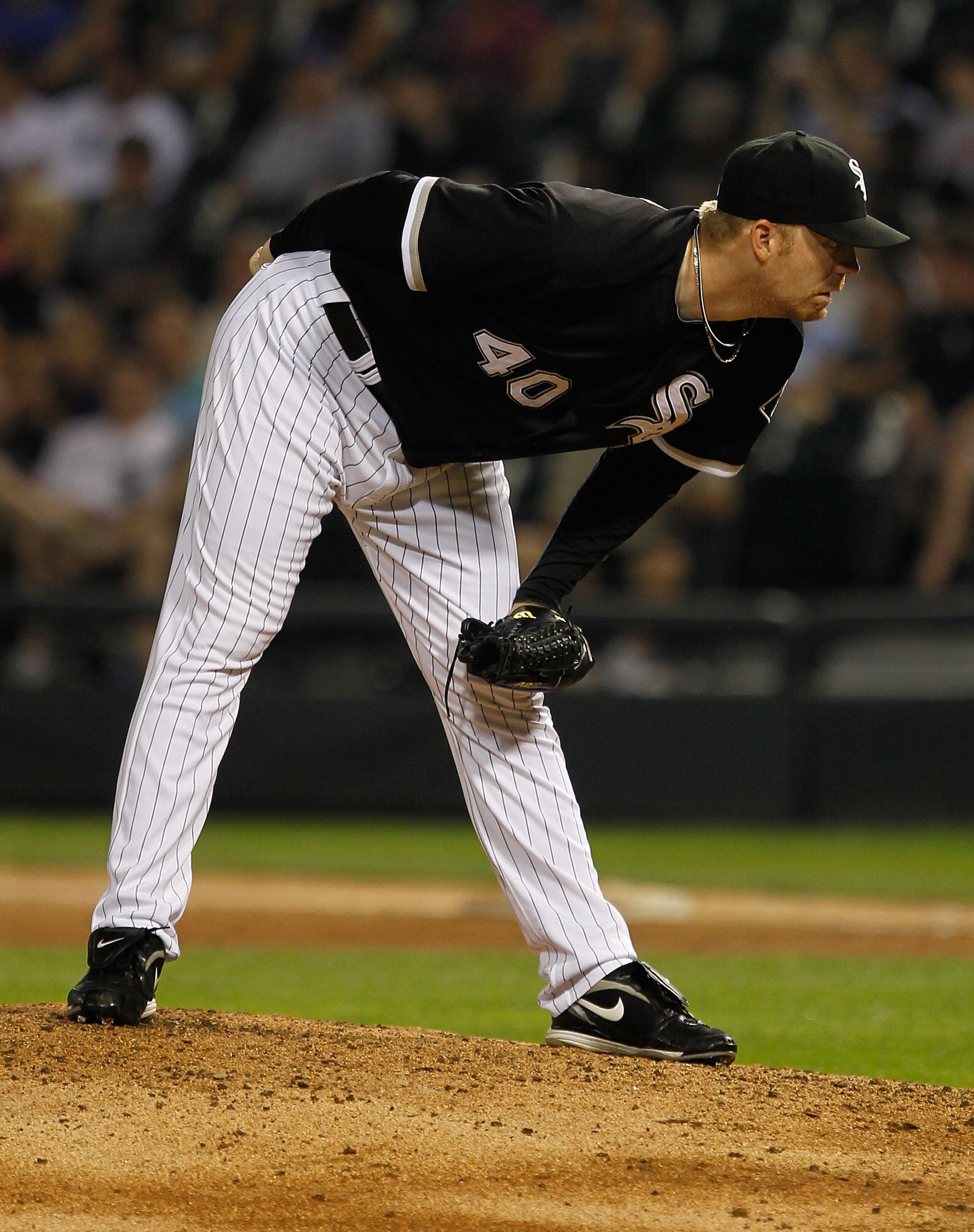 CHICAGO - JULY 07: J.J. Putz #40 of the Chicago White Sox looks for the catchers' signs before pitching against the Los Angeles Angels of Anaheim at U.S. Cellular Field on July 7, 2010 in Chicago, Illinois. The White Sox defeated the Angels 5-2.  (Photo b