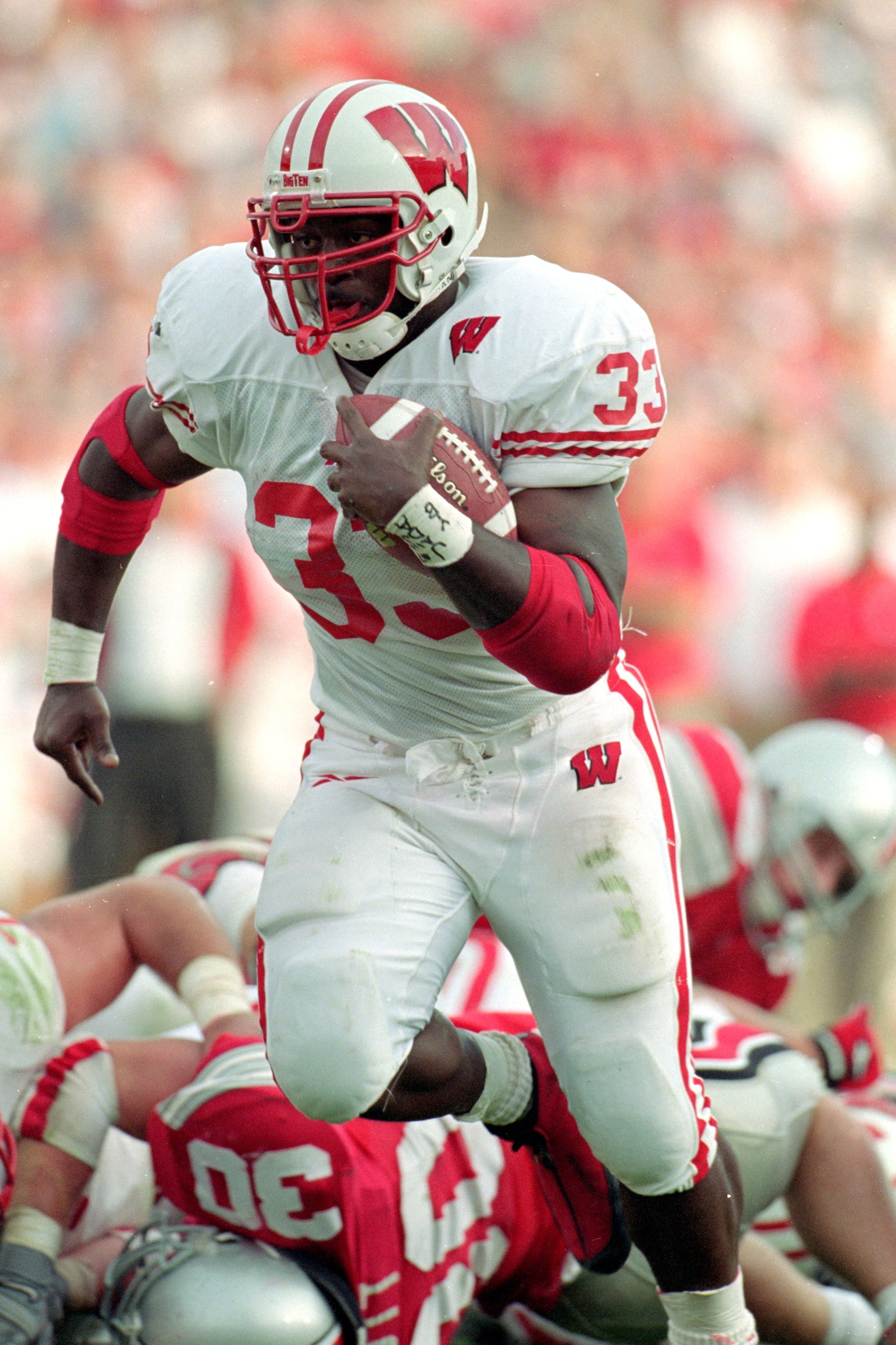 2 Oct 1999: Ron Dayne #33 of the Wisconsin Badgers carries the ball during the game against the Ohio State Buckeyes at the Ohio Stadium in Columbus, Ohio. The Badgers defeated the Buckeyes 42-17. Mandatory Credit: Tom Hauck /Allsport 2 Oct 1999: Ron Dayne #33 of the Wisconsin Badgers carries the ball during the game against the Ohio State Buckeyes at the Ohio Stadium in Columbus, Ohio. The Badgers defeated the Buckeyes 42-17. Mandatory Credit: Tom Hauck /Allsport