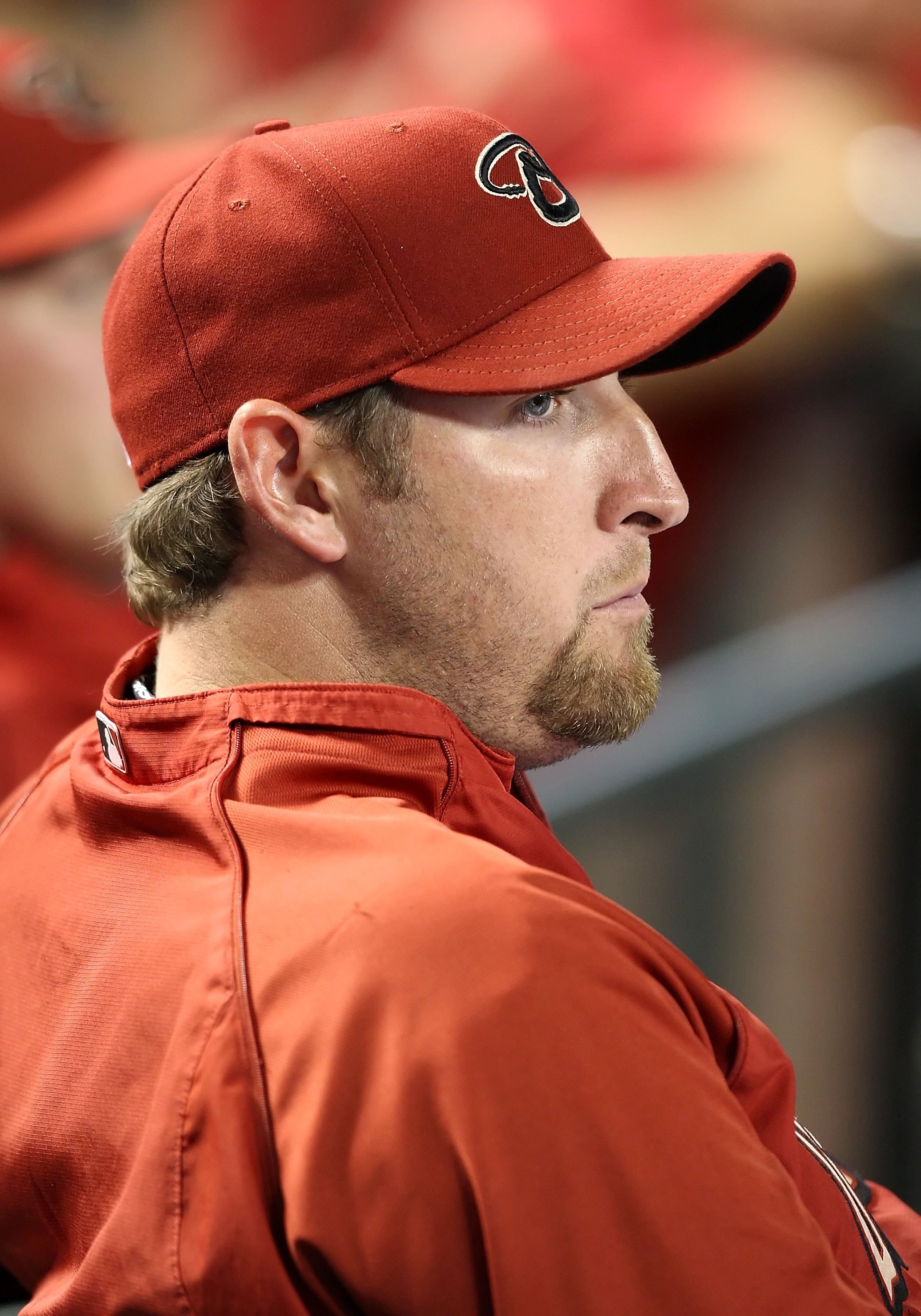 PHOENIX - APRIL 10:  Pitcher Brandon Webb #17 of the Arizona Diamondbacks looks on during the game  against the Los Angeles Dodgers at Chase Field on April 10, 2009 in Phoenix, Arizona. The Diamondbacks defeated the Dodgers 9-4.  (Photo by Christian Peter
