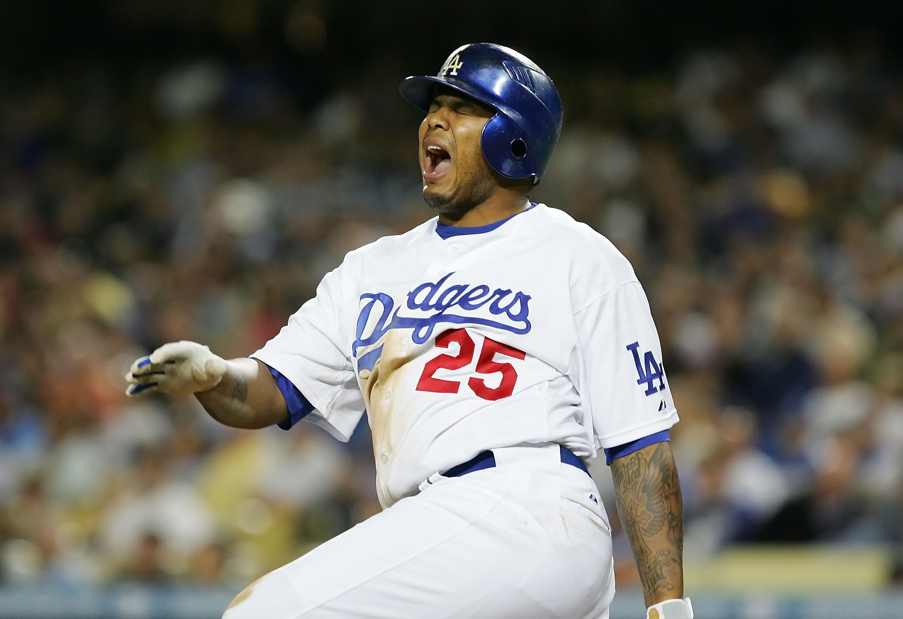 LOS ANGELES, CA - APRIL 25:   Andruw Jones #25 of the Los Angeles Dodgers reacts while at bat during the third inning against the Colorado Rockies at Dodger Stadium on April 25, 2008 in Los Angeles, California.  (Photo by Lisa Blumenfeld/Getty Images)