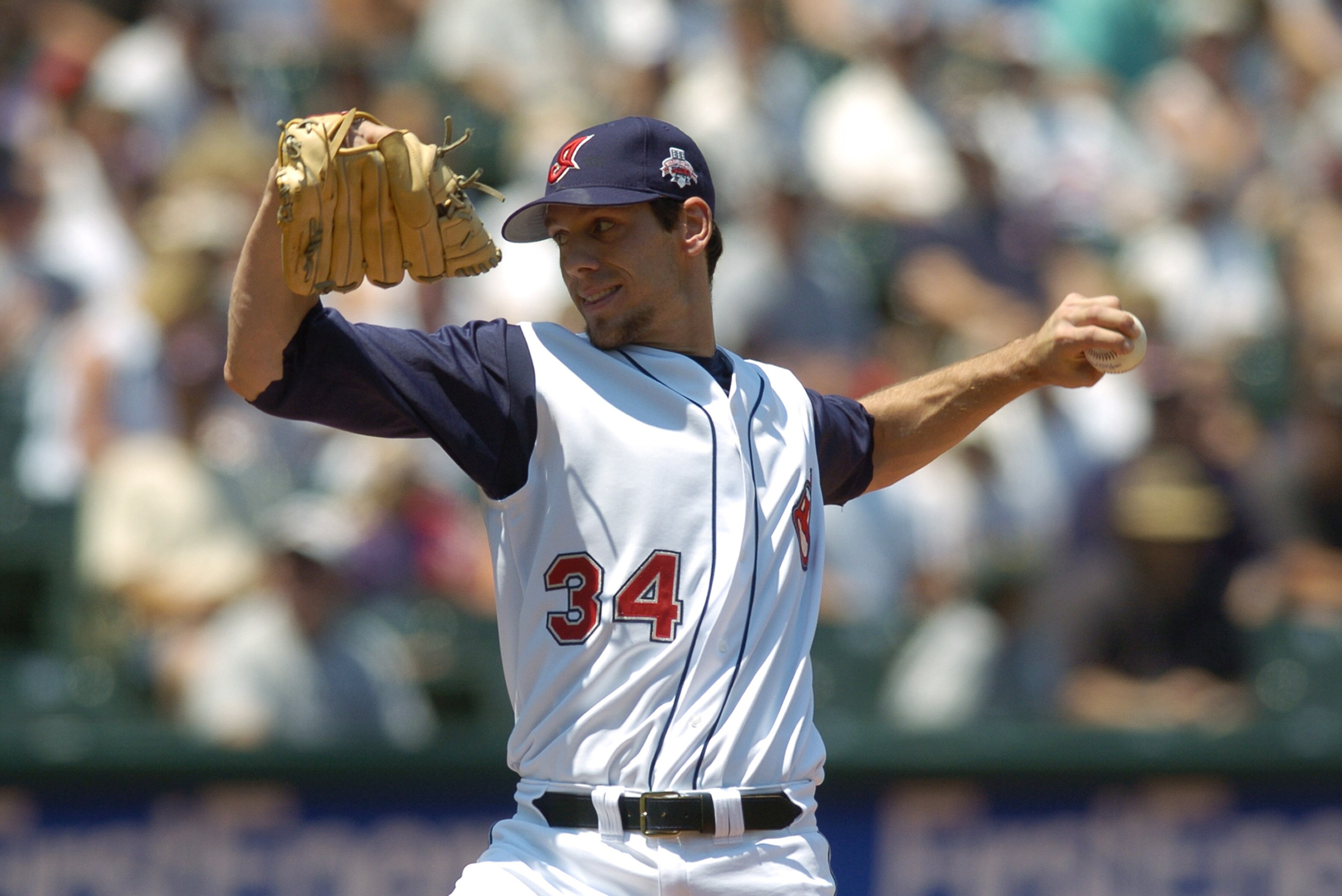 CLEVELAND - JULY 11:  Cliff Lee #34 of the Cleveland Indians pitches against the Oakland Athletics during the game on July 11, 2004 at Jacobs Field in Cleveland, Ohio.  The Indians defeated the A's 4-1.  (Photo by David Maxwell/Getty Images)