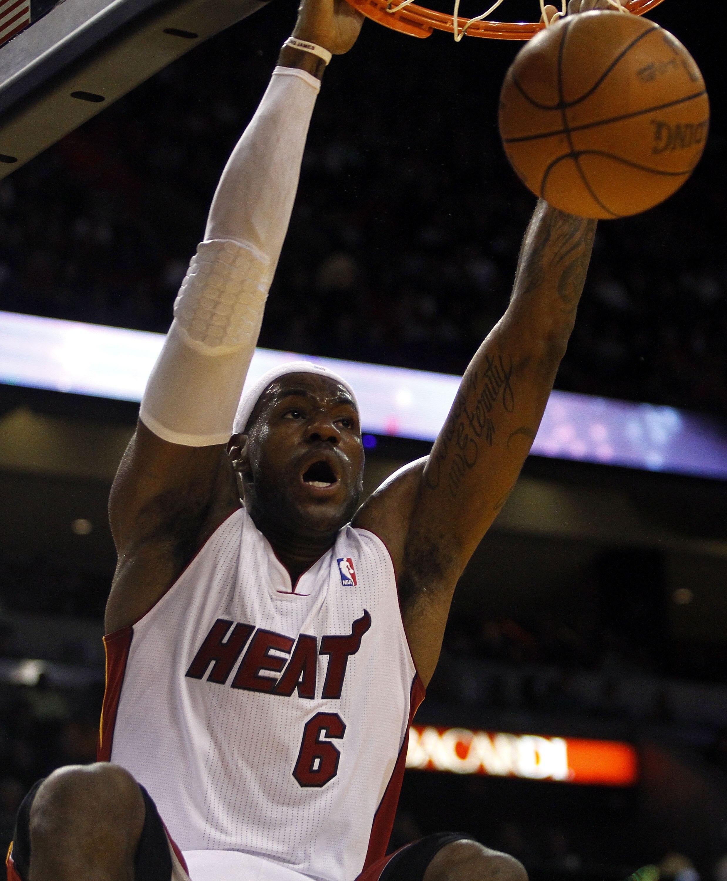 MIAMI - NOVEMBER 13:  Forward LeBron James #6 of the Miami Heat dunks against the Toronto Raptors at American Airlines Arena on November 13, 2010 in Miami, Florida. NOTE TO USER: User expressly acknowledges and agrees that, by downloading and or using thi