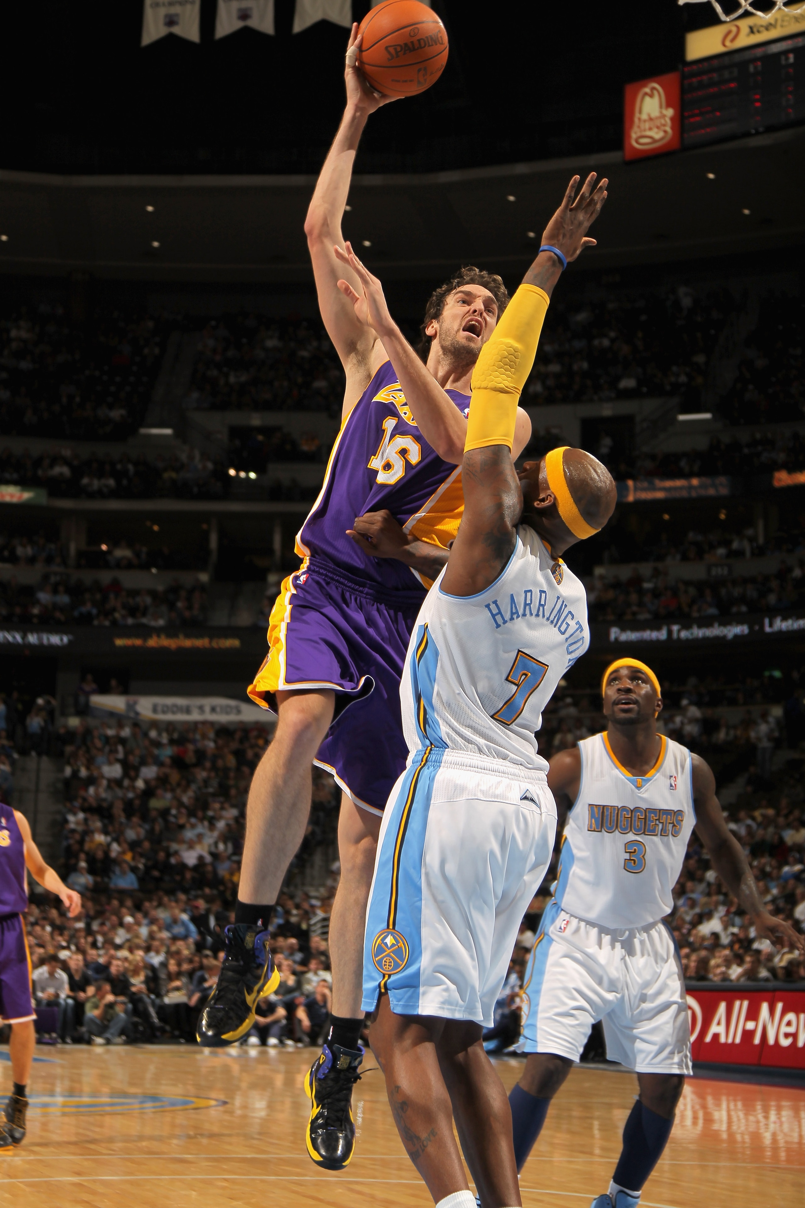 DENVER - NOVEMBER 11: Pau Gasol #16 of the Los Angeles Lakers takes a shot over Al Harrington #7 of the Denver Nuggets at the Pepsi Center on November 11, 2010 in Denver, Colorado. The Nuggets defeated the Lakers 118-112. NOTE TO USER: User expressly ac DENVER - NOVEMBER 11: Pau Gasol #16 of the Los Angeles Lakers takes a shot over Al Harrington #7 of the Denver Nuggets at the Pepsi Center on November 11, 2010 in Denver, Colorado. The Nuggets defeated the Lakers 118-112. NOTE TO USER: User expressly ac