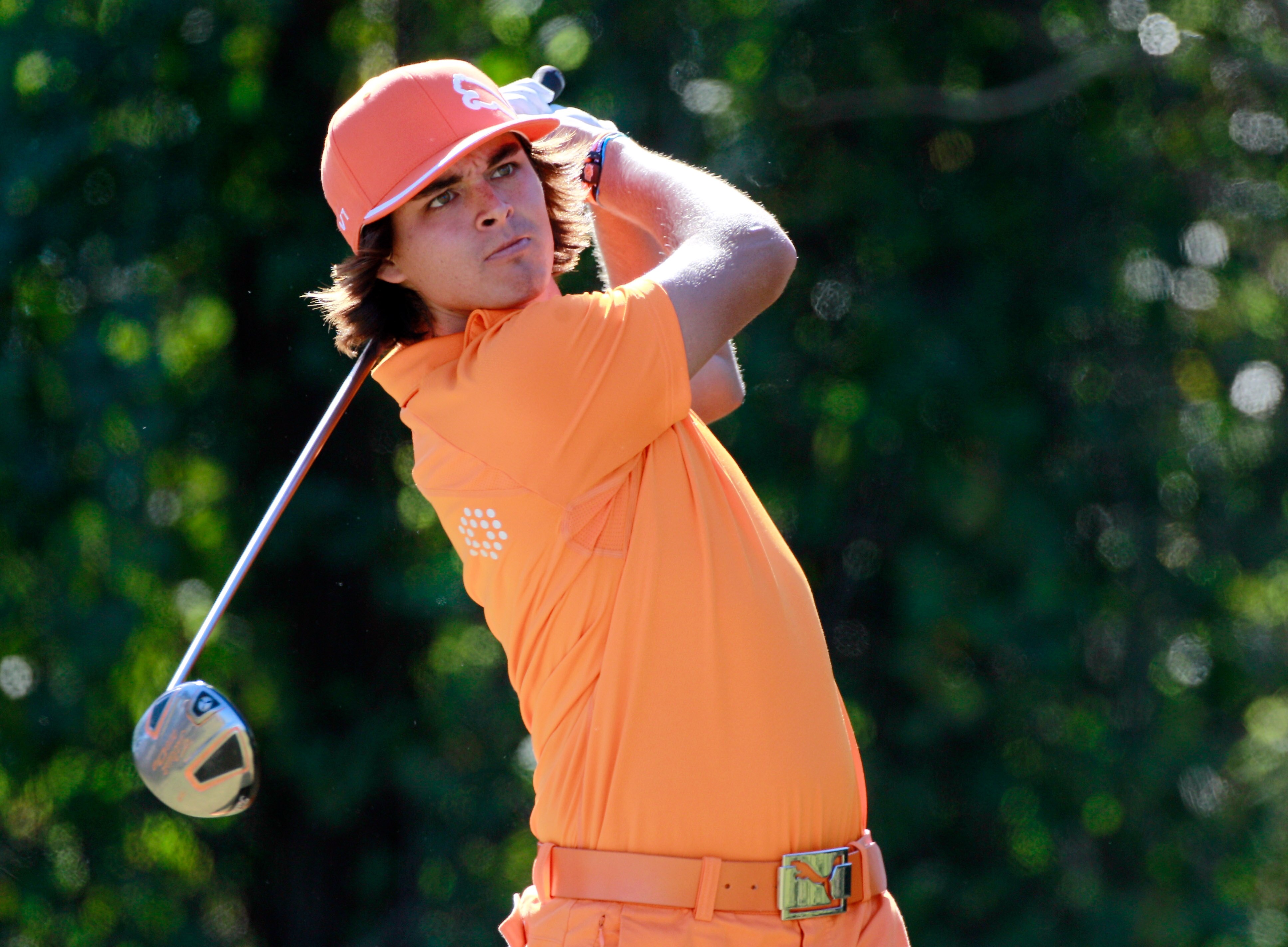 LAKE BUENA VISTA, FL - NOVEMBER 14:  Rickie Fowler plays a shot on the 4th hole during the final round of the Children's Miracle Network Classic at the Disney Magnolia course on November 14, 2010 in Lake Buena Vista, Florida.  (Photo by Sam Greenwood/Gett