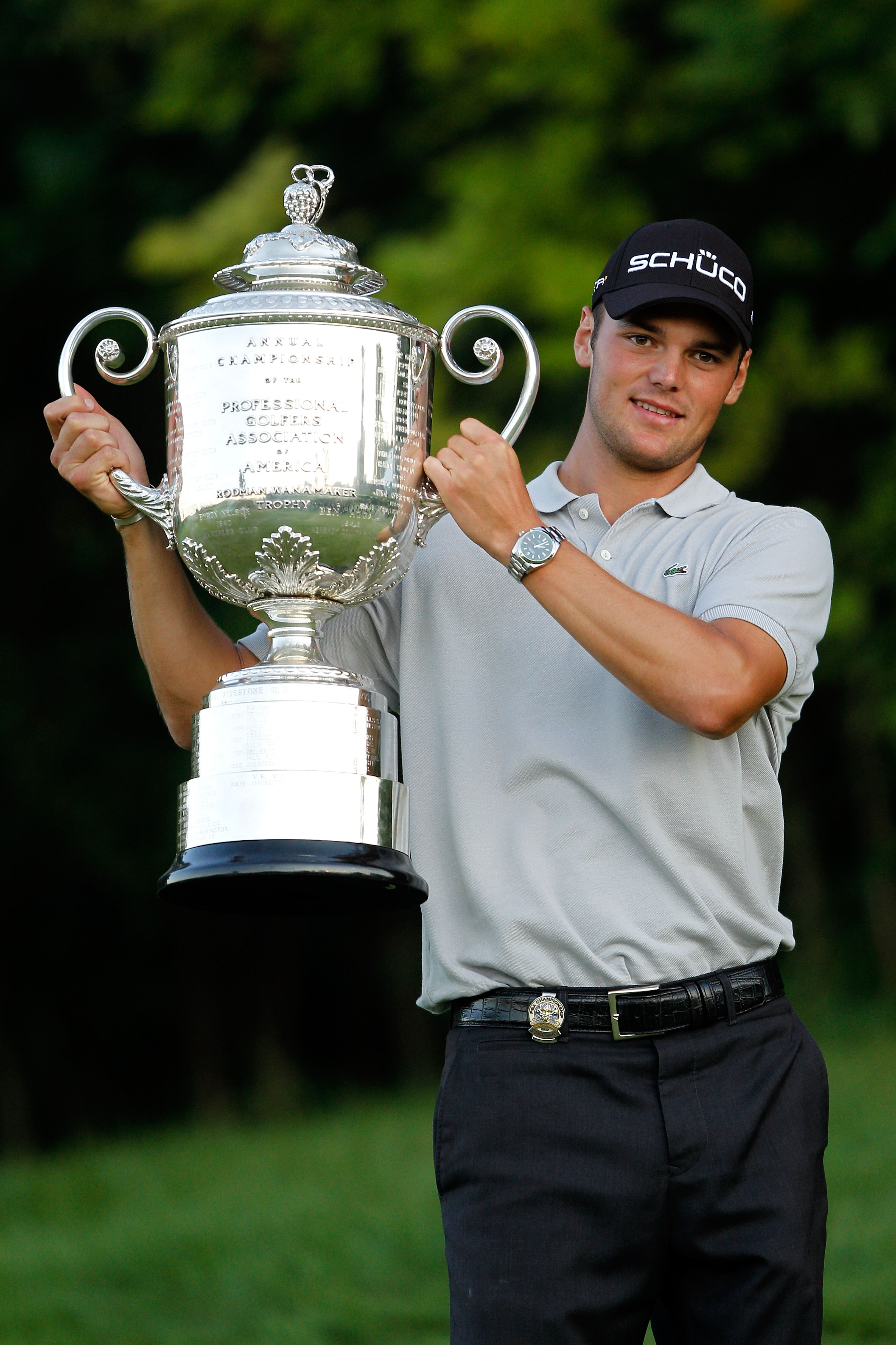 KOHLER, WI - AUGUST 15:  Martin Kaymer of Germany poses with the Wanamaker Trophy after defeating Bubba Watson during the three-hole aggregate playoff at the 92nd PGA Championship on the Straits Course at Whistling Straits on August 15, 2010 in Kohler, Wi