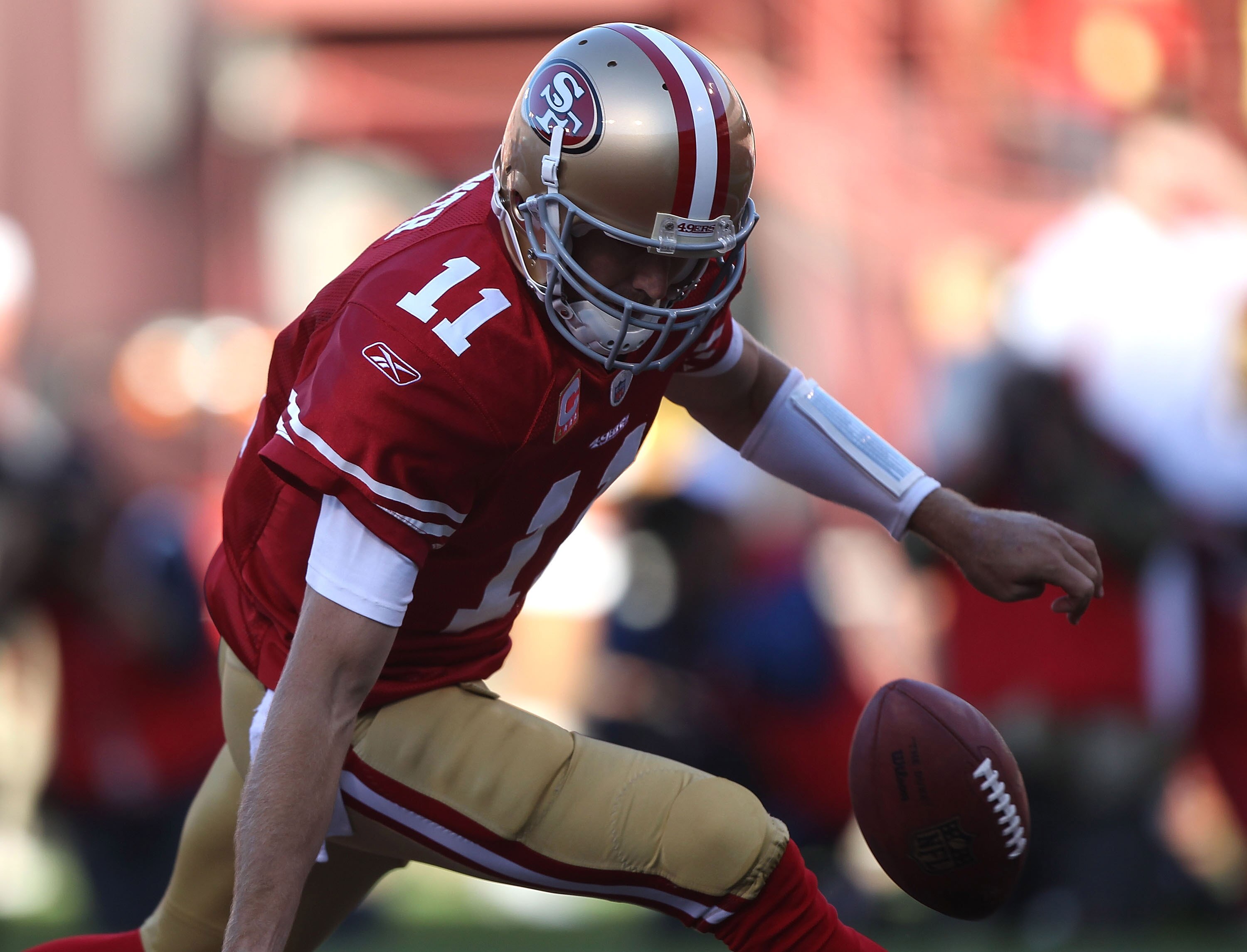 SAN FRANCISCO - SEPTEMBER 20:  Alex Smith #11 of the San Francisco 49ers looses the ball in the endzone for a saftey against the New Orleans Saints during an NFL game at Candlestick Park on September 20, 2010 in San Francisco, California.  (Photo by Jed J