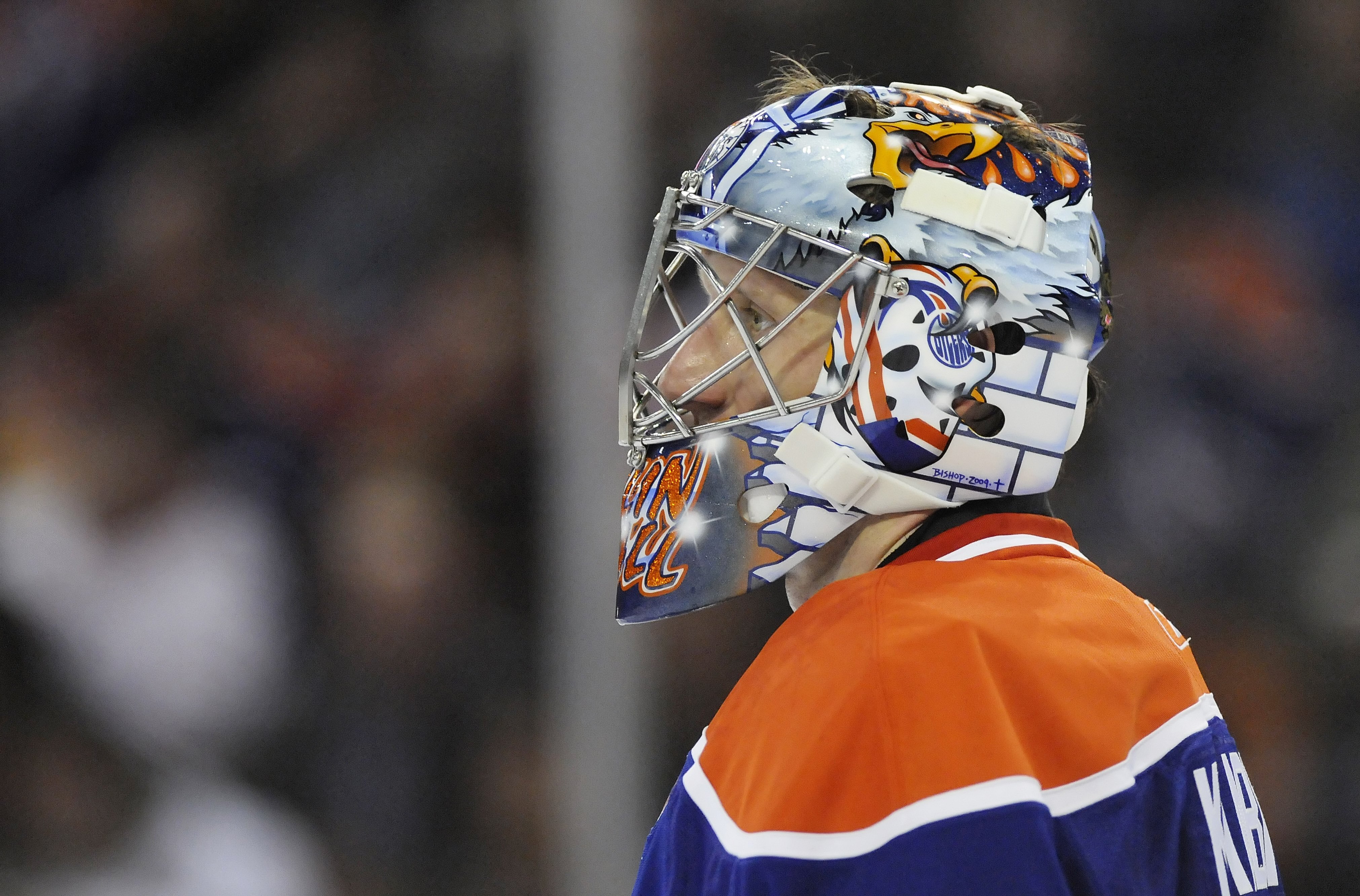 EDMONTON, AB - OCTOBER 3: Goalie Nikolai Khabibulin #35 of the Edmonton Oilers takes a break in a game between the Calgary Flames and the Edmonton Oilers during an NHL game on October 3, 2009 at Rexall Arena in Edmonton, Canada. The Flames defeated the Oi