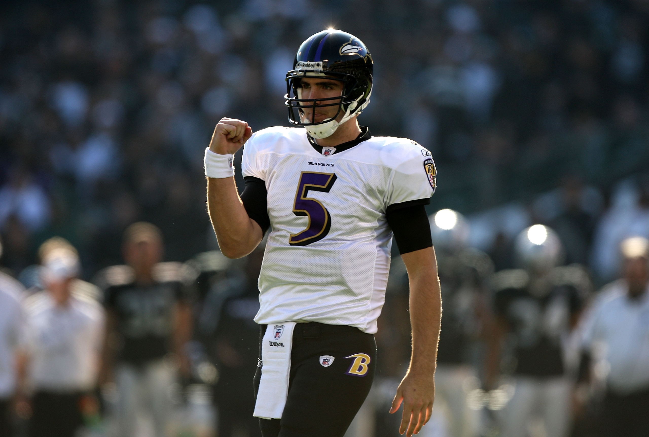 OAKLAND, CA - JANUARY 3:  Joe Flacco #5 of the Baltimore Ravens celebrates after a touchdown in the first quarter against the Oakland Raiders during an NFL game at Oakland-Alameda County Coliseum on January 3, 2010 in Oakland, California. (Photo by Jed Ja