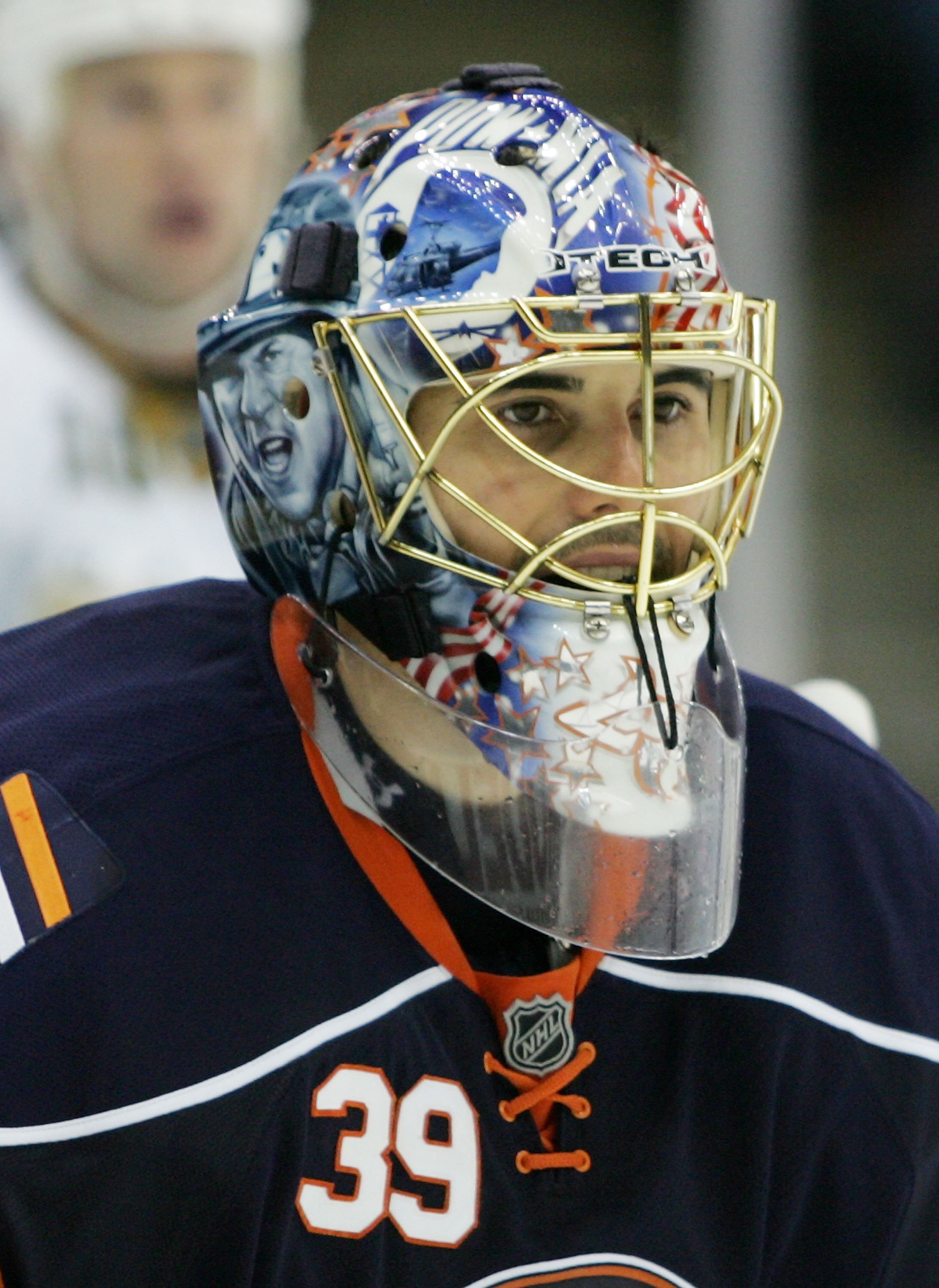 UNIONDALE, NY - OCTOBER 23: Goaltender Rick DiPietro #39 of the New York Islanders looks on  against the Dallas Stars during the game at the Nassau Coliseum on October 23, 2008, in Uninodale, New York.  (Photo by Andy Marlin/Getty Images)