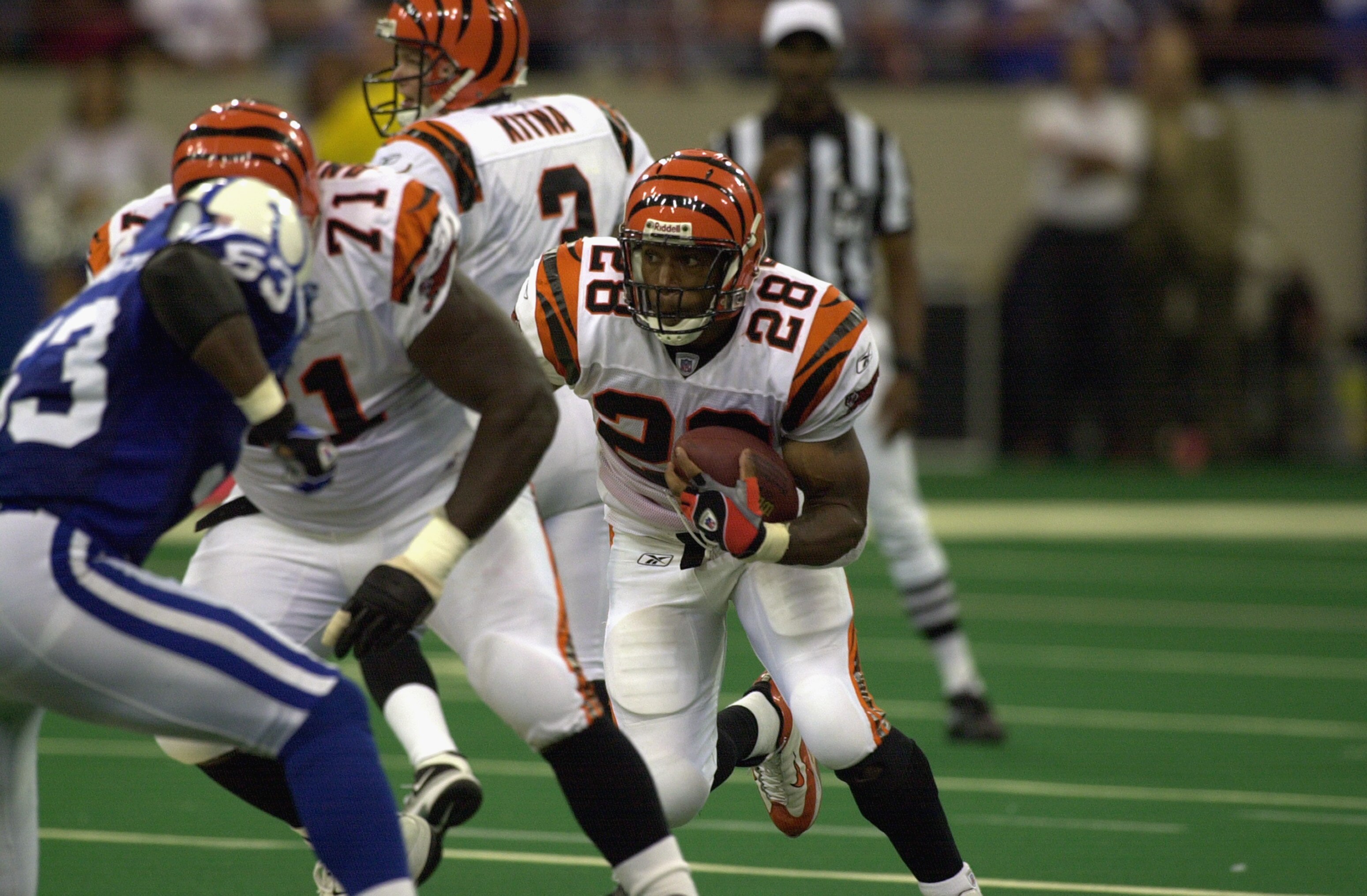 INDIANAPOLIS - OCTOBER 6:  Running back Corey Dillon #28 of the Cincinnati Bengals runs with the ball during the NFL game against the Indianapolis Colts at the RCA Dome on October 6, 2002 in Indianapolis, Indiana. The Colts defeated the Bengals 28-21. (Ph