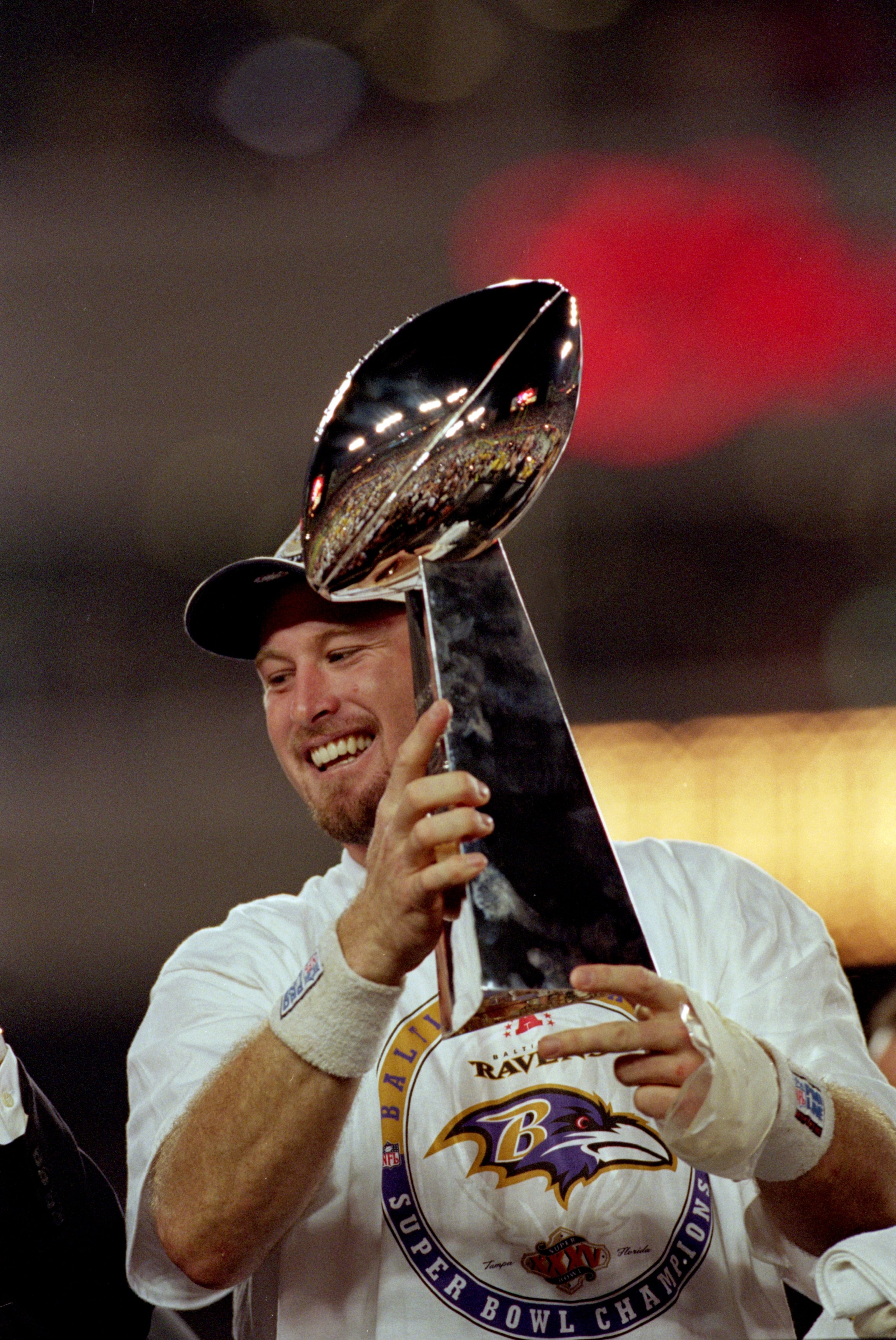 28 Jan 2001:  Trent Dilfer #8 of the Baltimore Ravens hold the Lombardi Trophy after the Super Bowl XXXV Game against the New York Giants at the Raymond James Stadium in Tampa, Florida. The Ravens defeated the Giants 34-7.Mandatory Credit: Andy Lyons  /Al