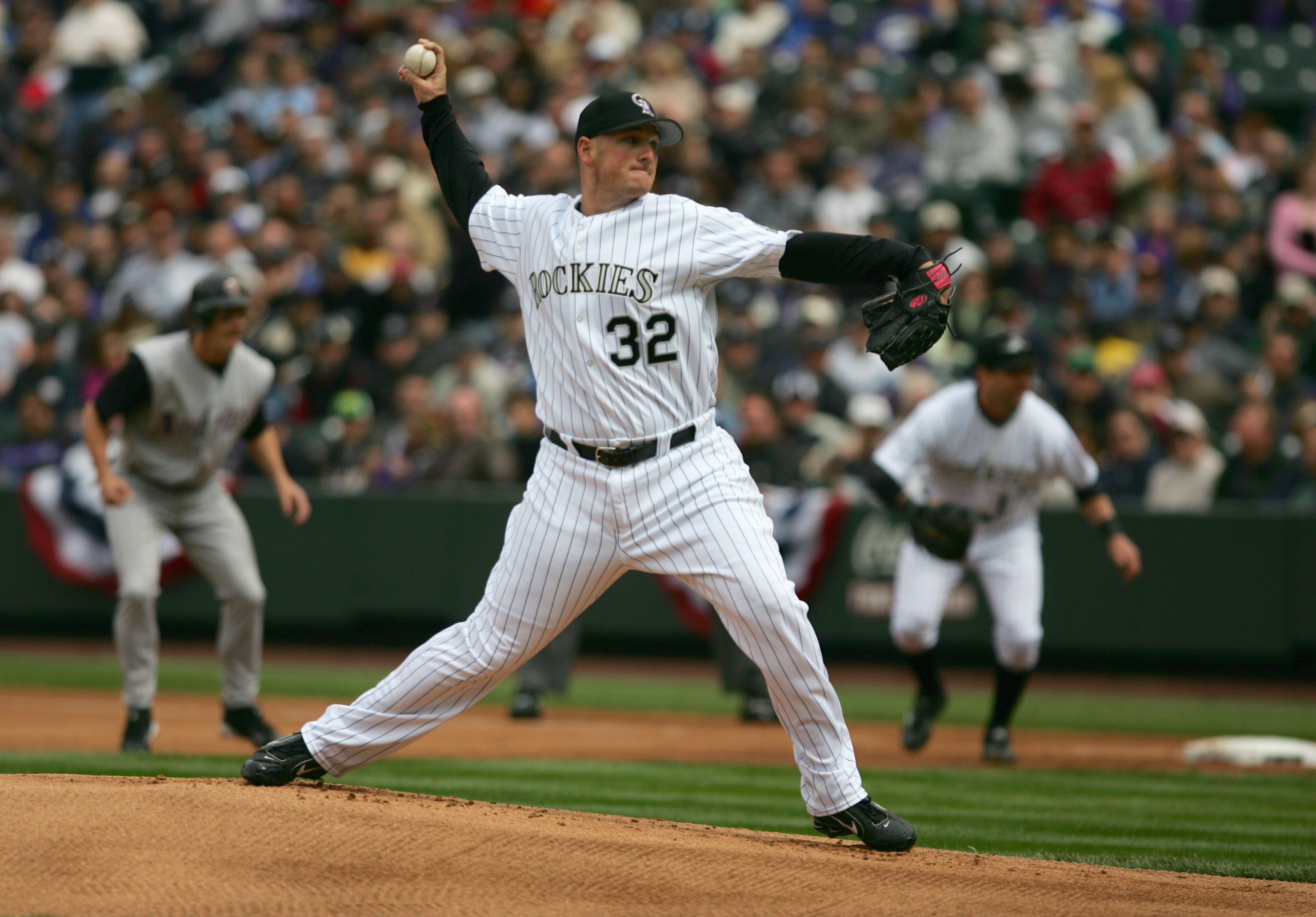 DENVER - APRIL 03: Pitcher Jason Jennings #32 of the Colorado Rockies winds back to pitch against the Arizona Diamondbacks on Opening Day at Coors Field on April 3, 2006 in Denver, Colorado. The Rockies defeated the Arizona Diamondbacks 3-2 in 11 innings.