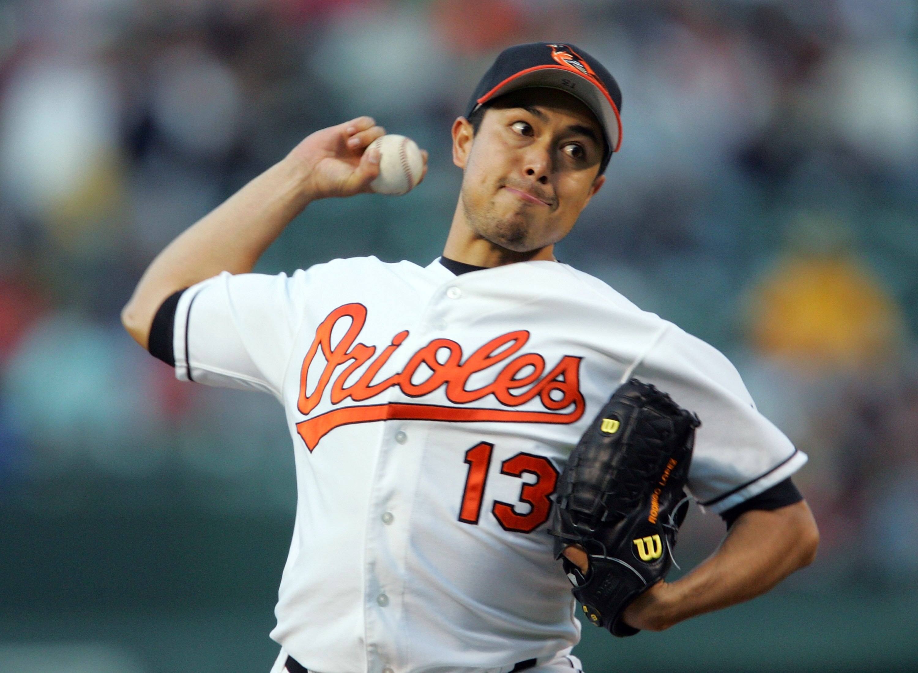 BALTIMORE - MAY 15:  Starting pitcher Rodrigo Lopez #13 of the Baltimore Orioles pitches during the second inning against the Boston Red Sox May 15, 2006 at Camden Yards in Baltimore, Maryland.  (Photo by Jamie Squire/Getty Images)