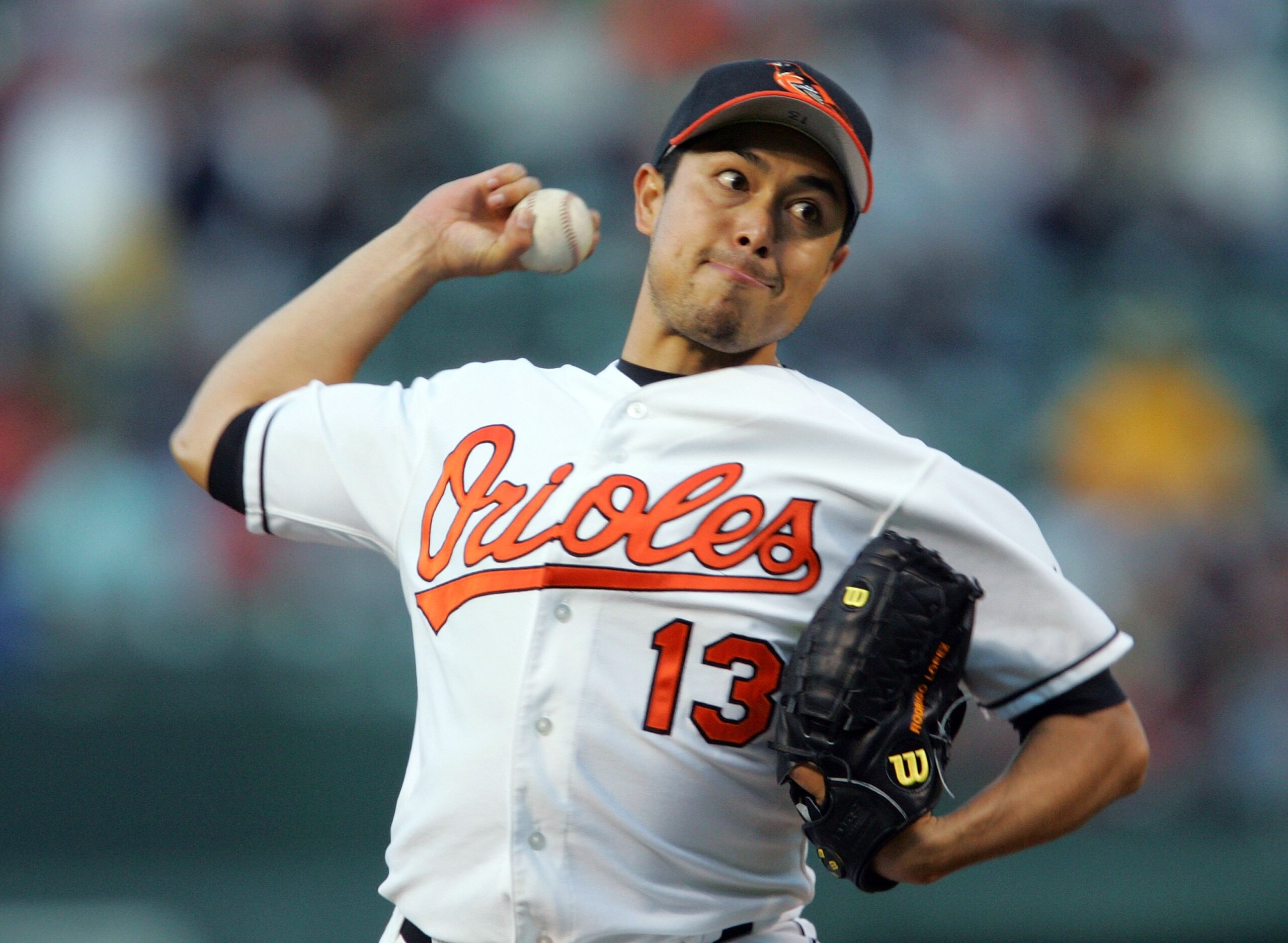 BALTIMORE - MAY 15:  Starting pitcher Rodrigo Lopez #13 of the Baltimore Orioles pitches during the second inning against the Boston Red Sox May 15, 2006 at Camden Yards in Baltimore, Maryland.  (Photo by Jamie Squire/Getty Images)