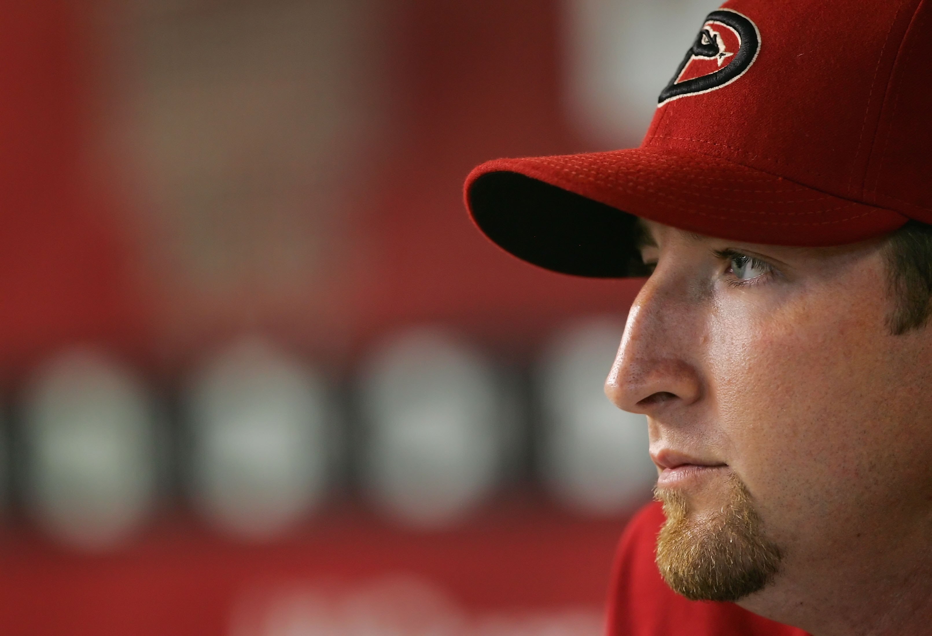 PHOENIX - AUGUST 05:  Brandon Webb #17 of the Arizona Diamondbacks sits in dugout before the game against the Pittsburgh Pirates at Chase Field on August 5, 2008 in Phoenix, Arizona.  (Photo by Lisa Blumenfeld/Getty Images)