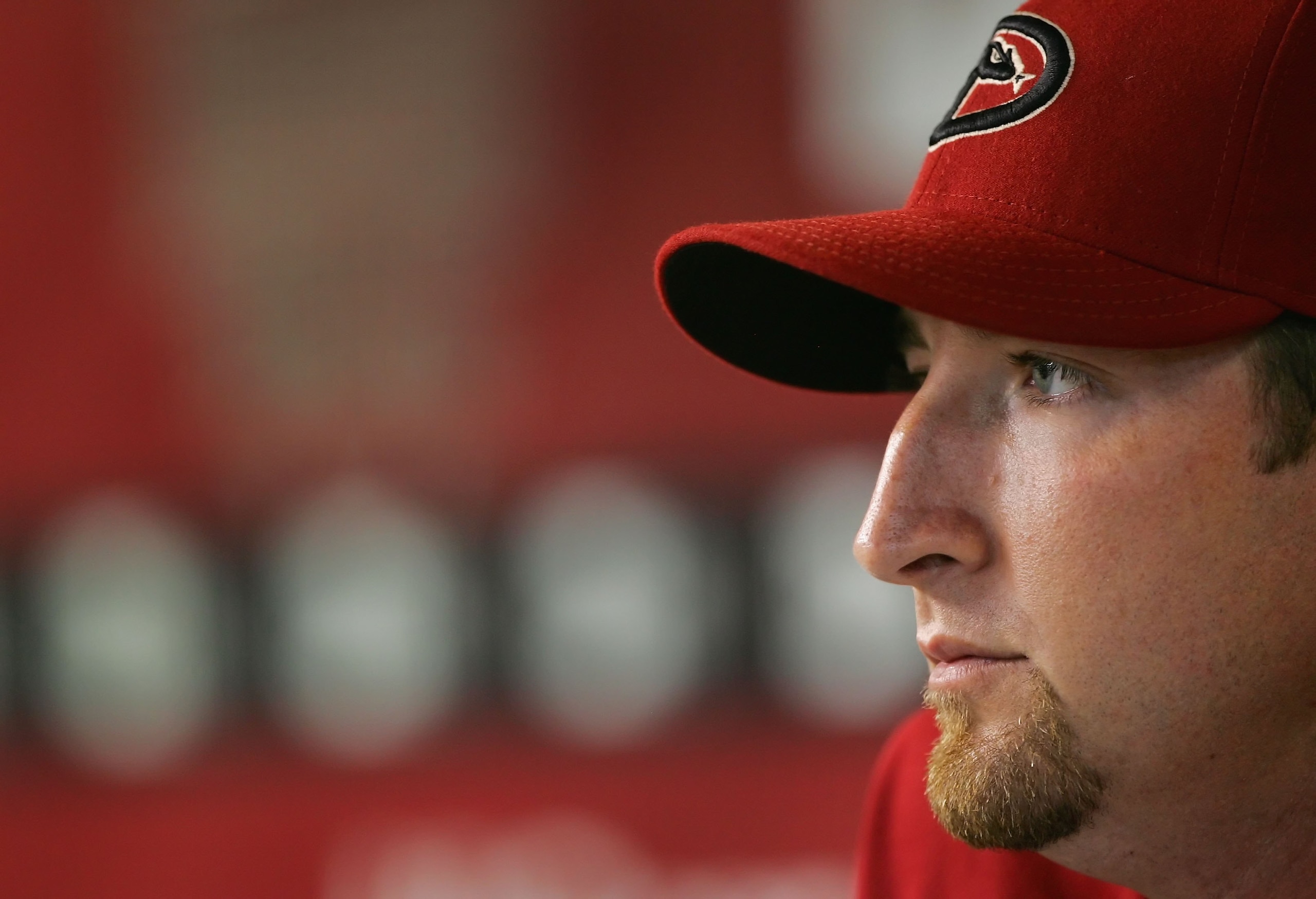 PHOENIX - AUGUST 05:  Brandon Webb #17 of the Arizona Diamondbacks sits in dugout before the game against the Pittsburgh Pirates at Chase Field on August 5, 2008 in Phoenix, Arizona.  (Photo by Lisa Blumenfeld/Getty Images)