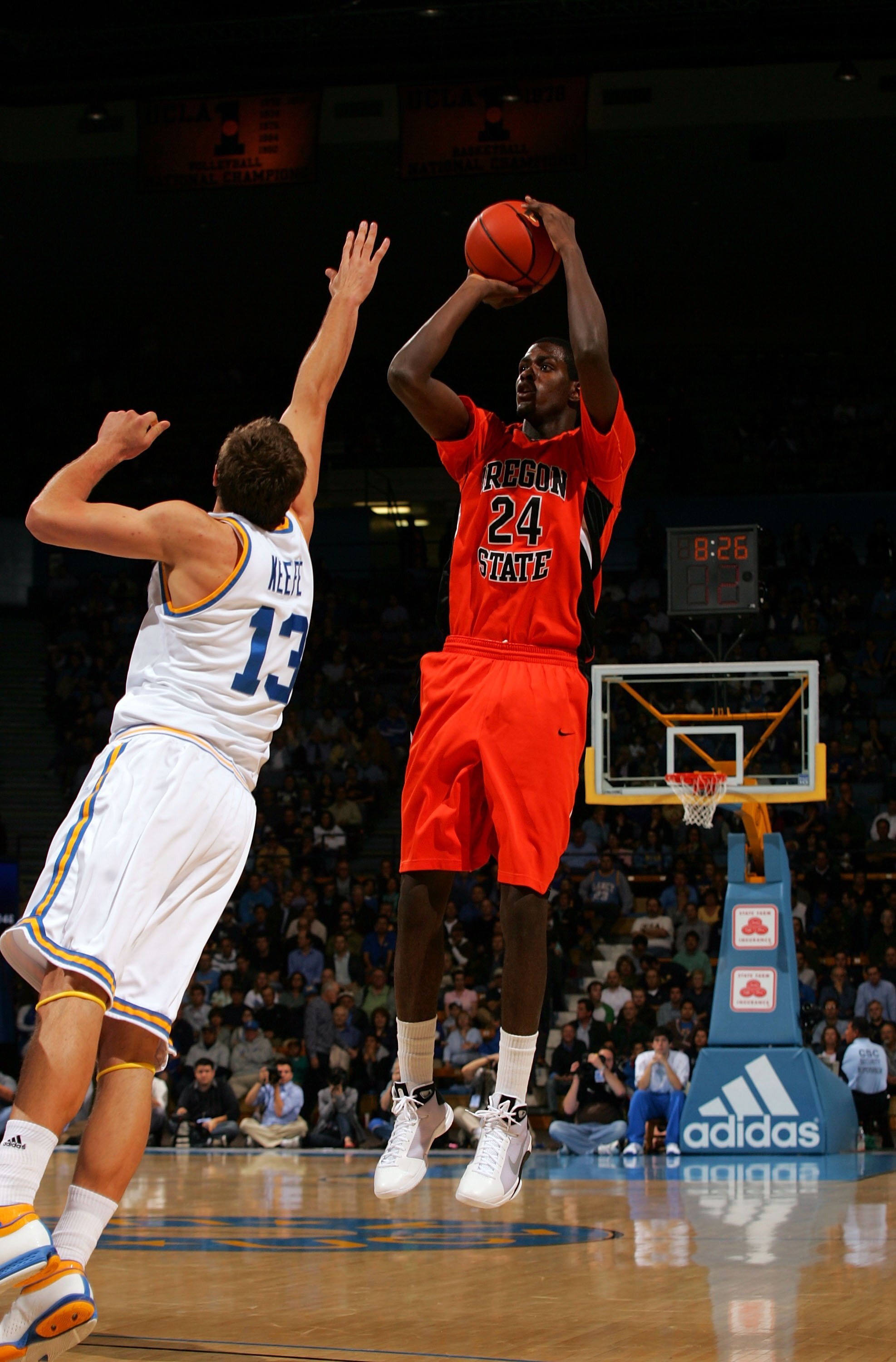 WESTWOOD, CA - MARCH 05:  Omari Johnson #24 of the Oregon State Beavers shoots the jump shot against James Keefe #13 of the UCLA Bruins in the first half during their NCAA basketball game at Pauley Pavilion on March 5, 2009 in Westwood, California. The Br