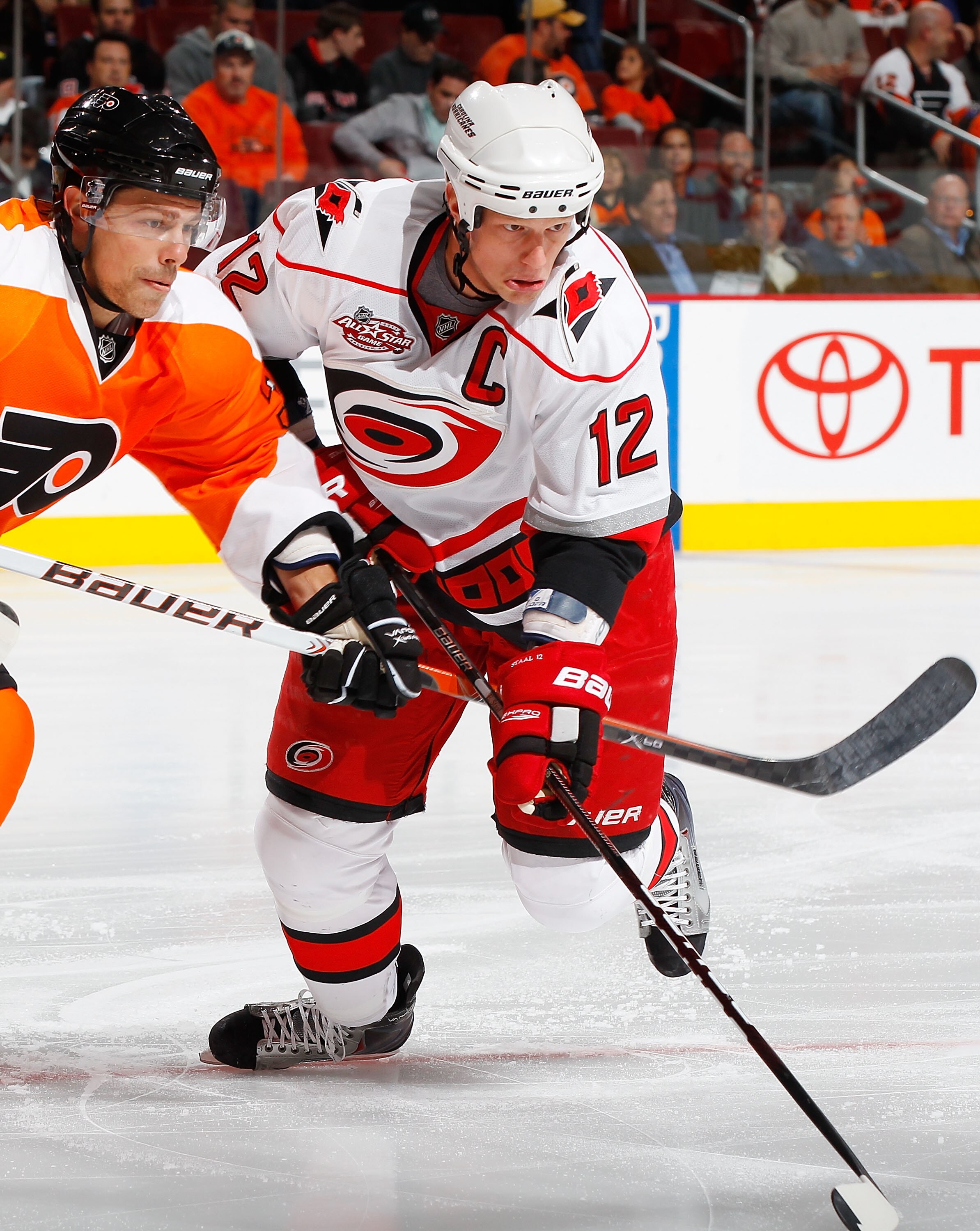 PHILADELPHIA - NOVEMBER 01:  Eric Staal #12 of the Carolina Hurricanes skates against the Philadelphia Flyers on November 1, 2010 at the Wells Fargo Center in Philadelphia, Pennsylvania. Flyers defeat the Hurricanes 3-2.  (Photo by Mike Stobe/Getty Images