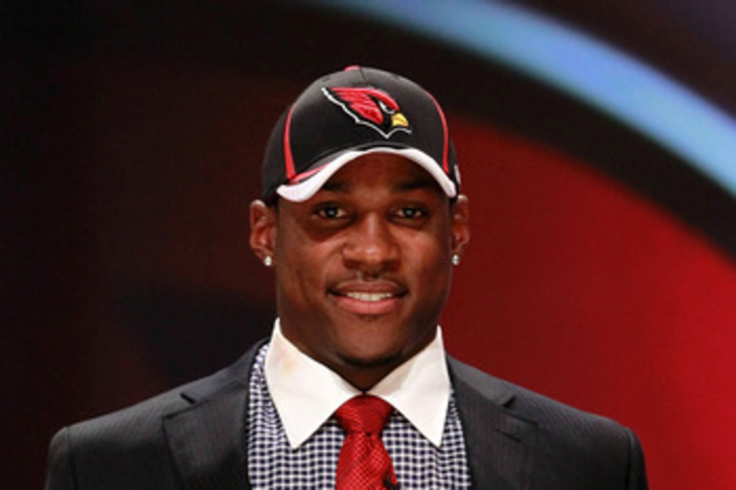 NEW YORK, NY - APRIL 28:  Patrick Peterson, #5 overall pick by the Arizona Cardinals, holds up his jersey on stage during the 2011 NFL Draft at Radio City Music Hall on April 28, 2011 in New York City.  (Photo by Chris Trotman/Getty Images)