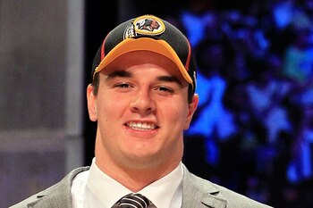 NEW YORK, NY - APRIL 28:  Ryan Kerrigan, #16 overall pick by the Washington Redskins, holds up a jersey on stage during the 2011 NFL Draft at Radio City Music Hall on April 28, 2011 in New York City.  (Photo by Chris Trotman/Getty Images)