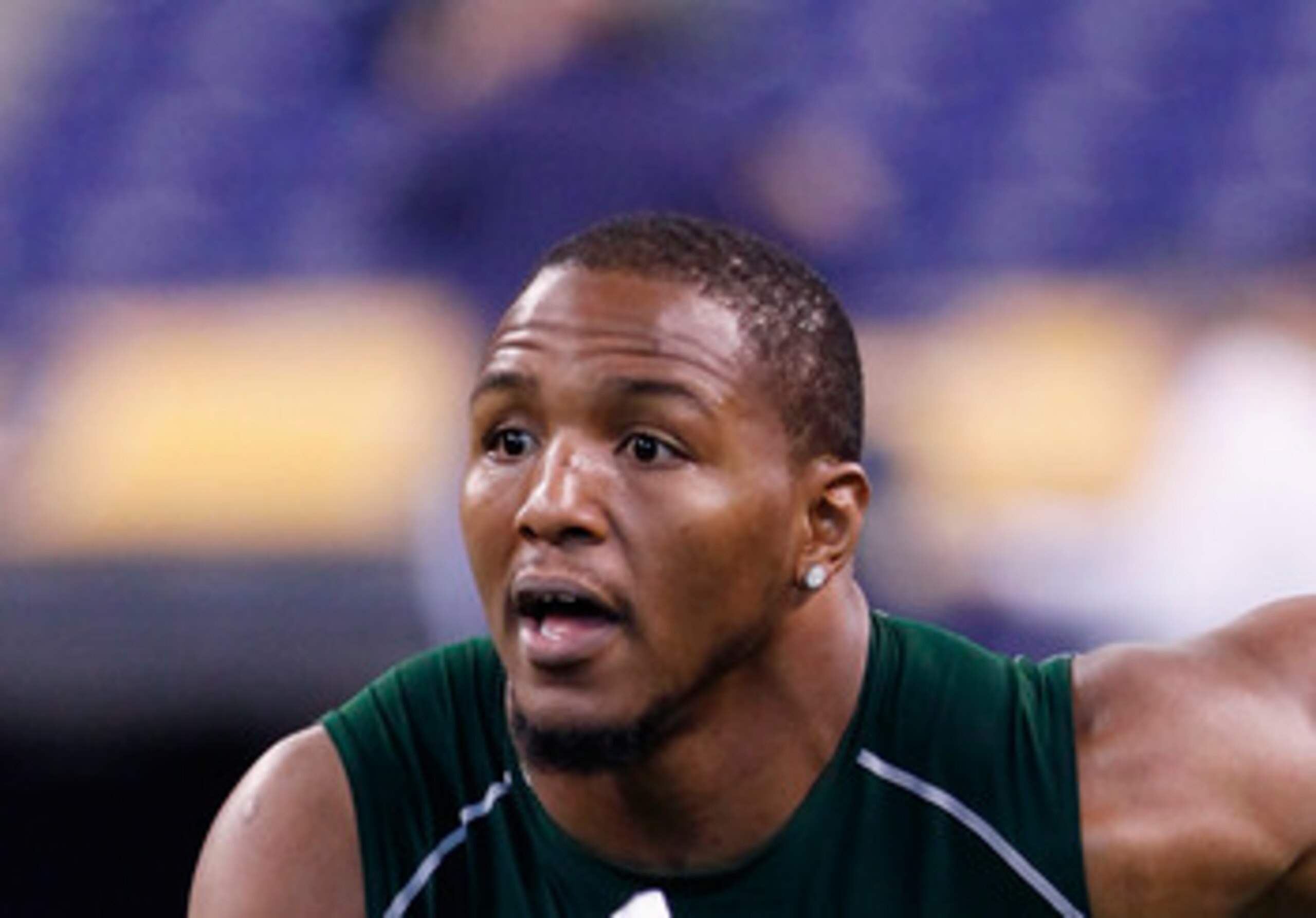 INDIANAPOLIS, IN - FEBRUARY 28:  Defensive lineman Robert Quinn of North Carolina runs through a drill during the 2011 NFL Scouting Combine at Lucas Oil Stadium on February 28, 2011 in Indianapolis, Indiana. (Photo by Joe Robbins/Getty Images)