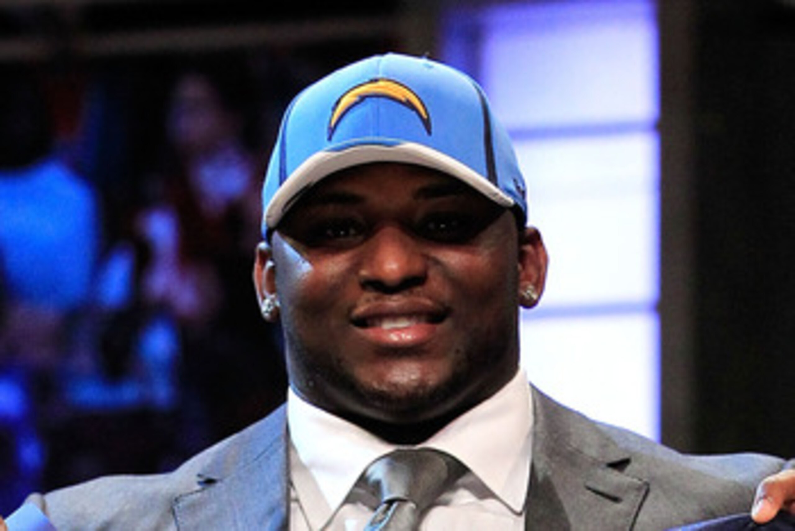 NEW YORK, NY - APRIL 28:  Corey Liuget, #18 overall pick by the San Diego Chargers, holds up a jersey on stage during the 2011 NFL Draft at Radio City Music Hall on April 28, 2011 in New York City.  (Photo by Chris Trotman/Getty Images)