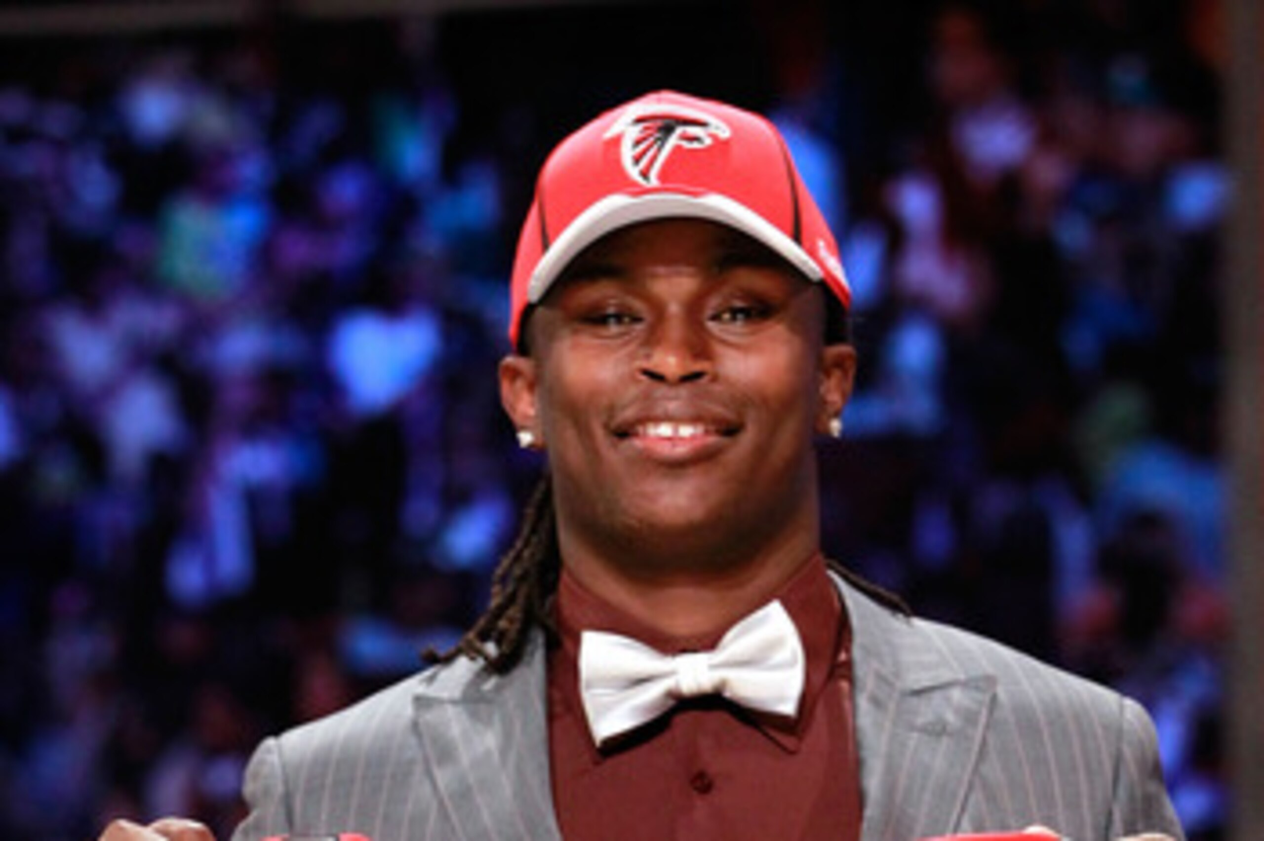 NEW YORK, NY - APRIL 28:  Julio Jones, #6 overall pick by the Atlanta Falcons, holds up a jersey on stage during the 2011 NFL Draft at Radio City Music Hall on April 28, 2011 in New York City.  (Photo by Chris Trotman/Getty Images)